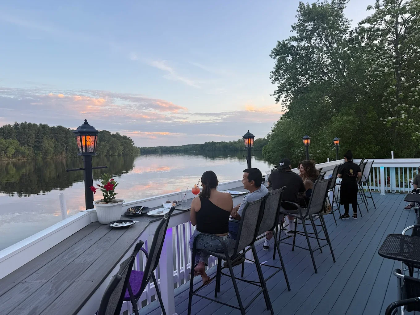Scenic riverside dining with sunset views