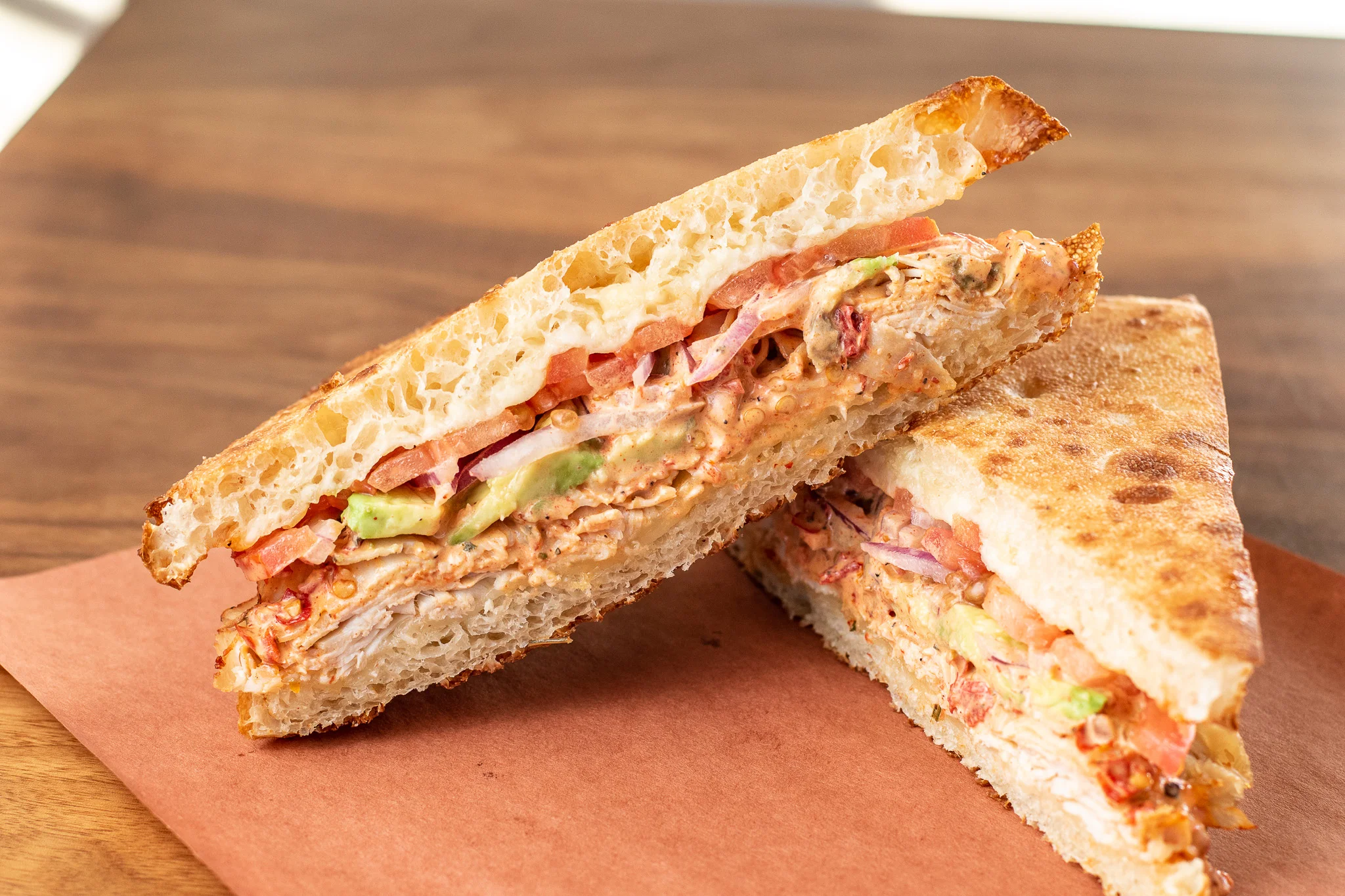 Savory chicken sandwich with fresh vegetables