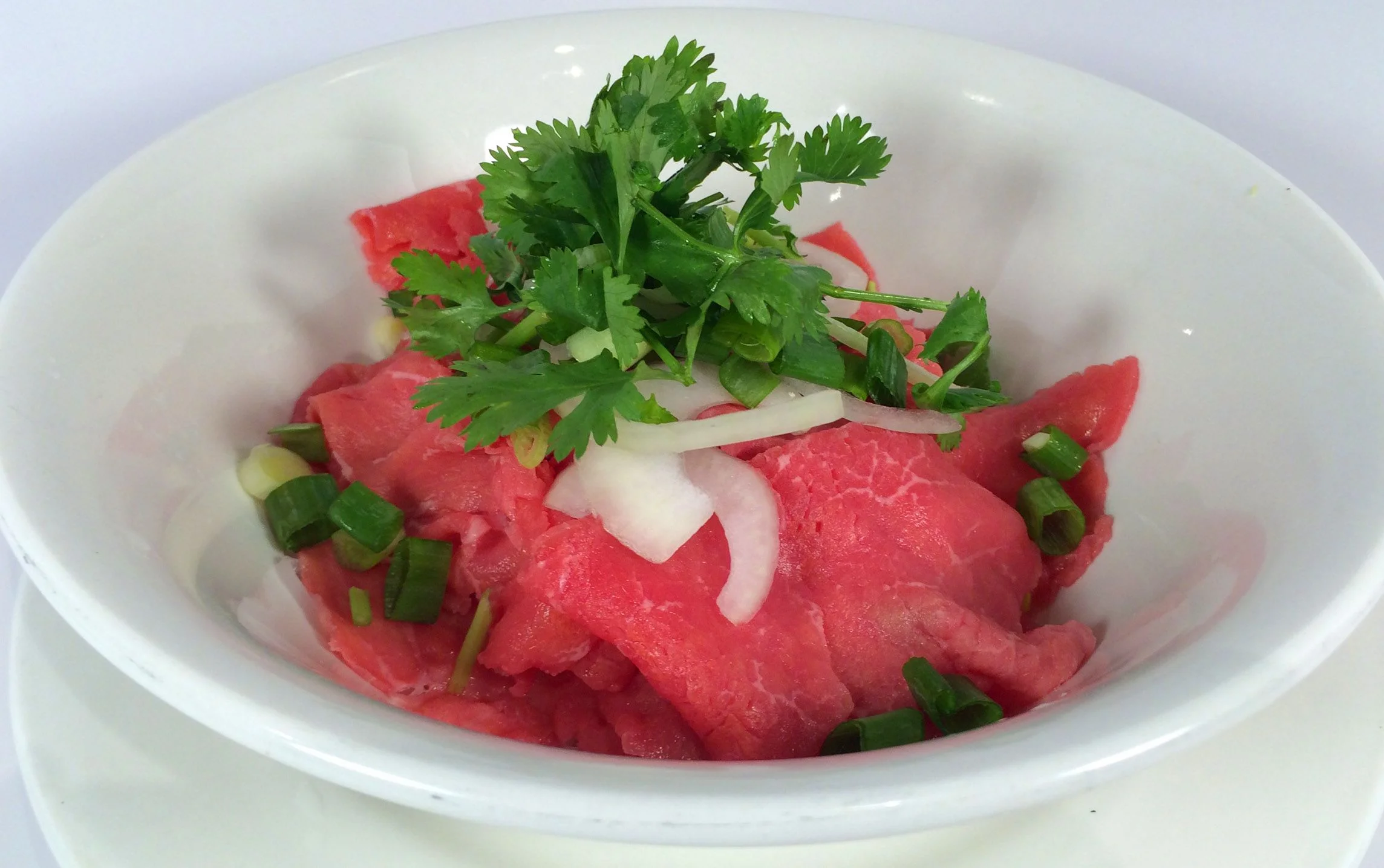 Thai beef salad with fresh herbs and vegetables
