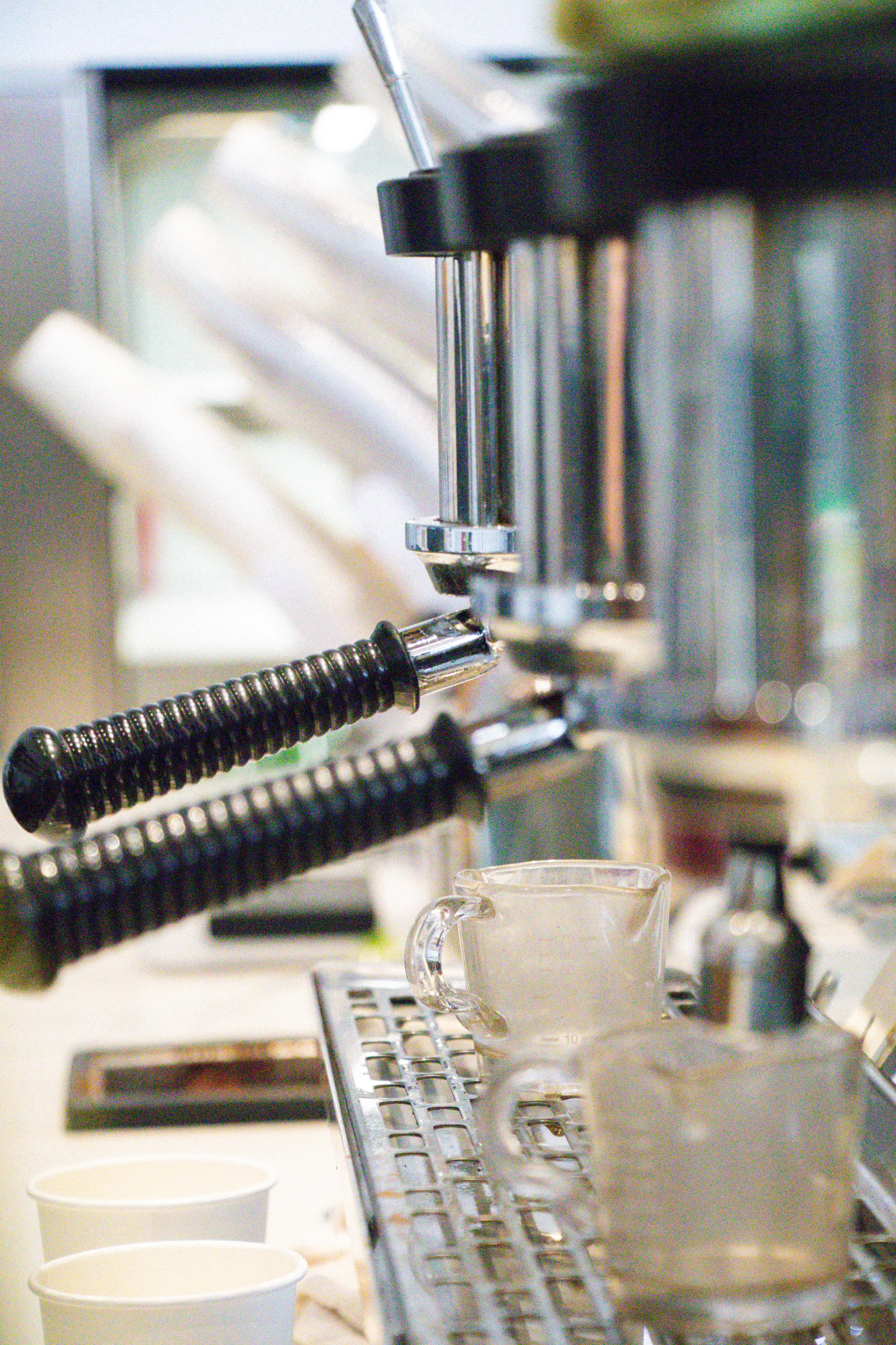 Coffee machine with espresso shots being prepared