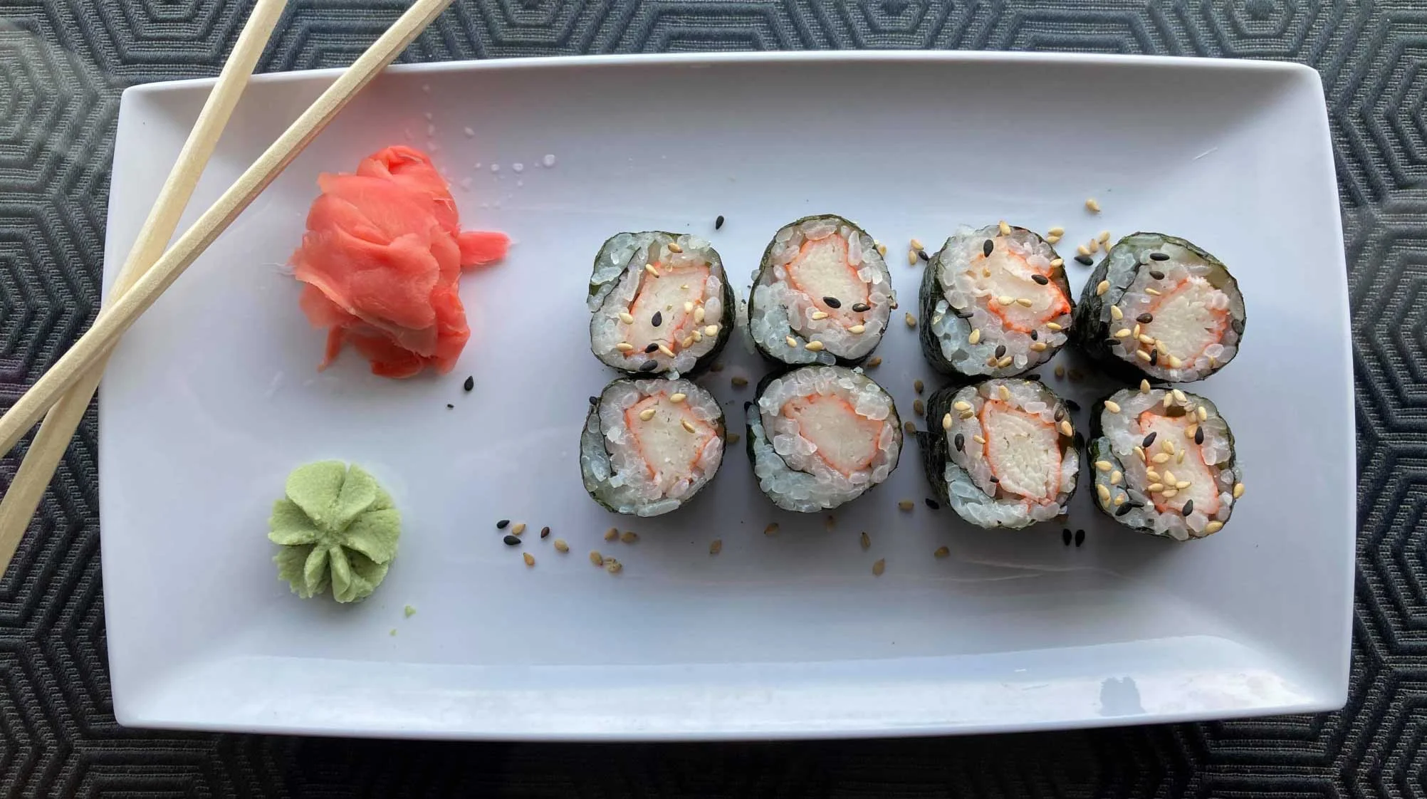 Japanese sushi rolls with pickled ginger and wasabi