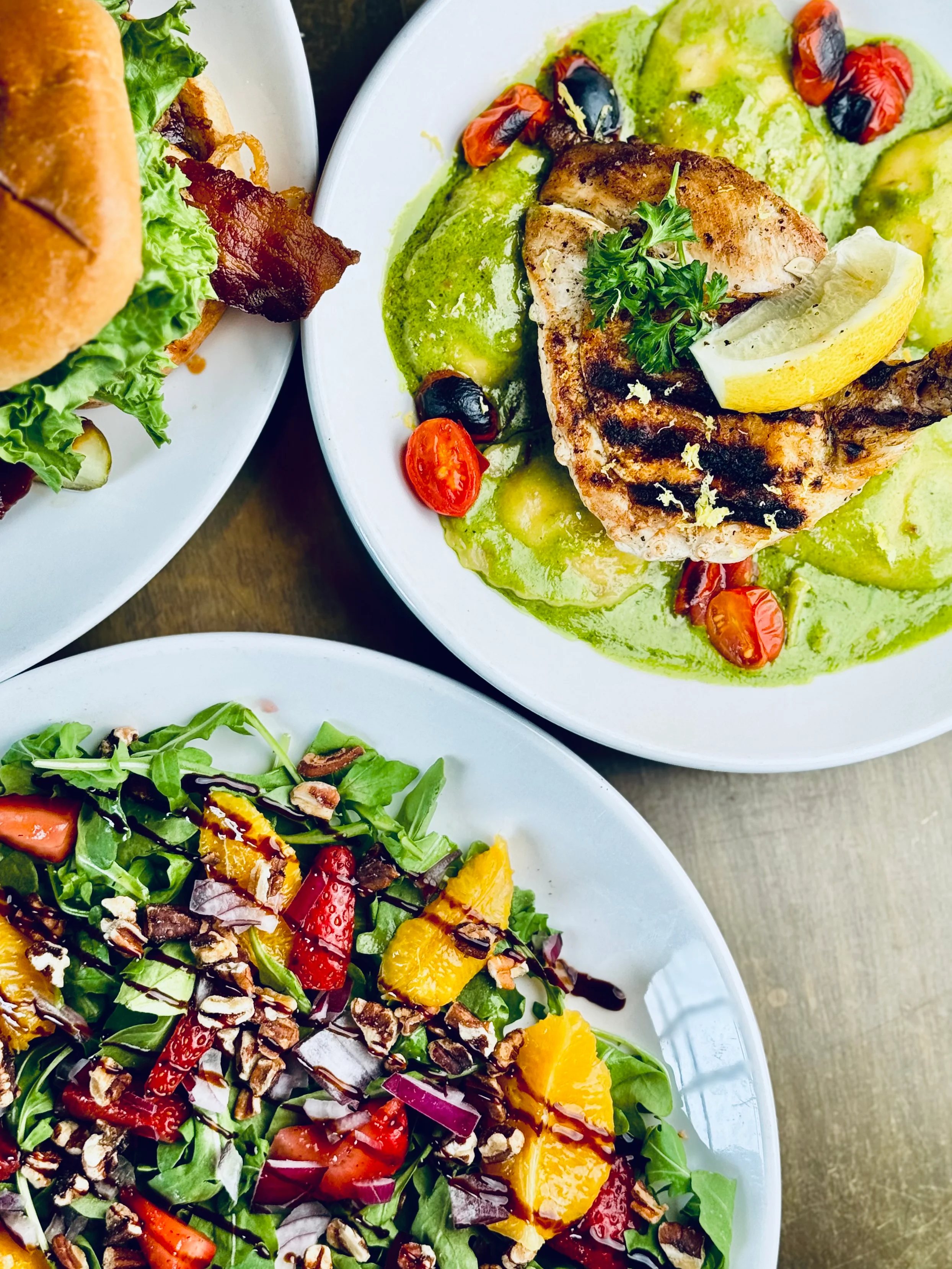 Grilled chicken with pesto sauce and fresh vegetables
