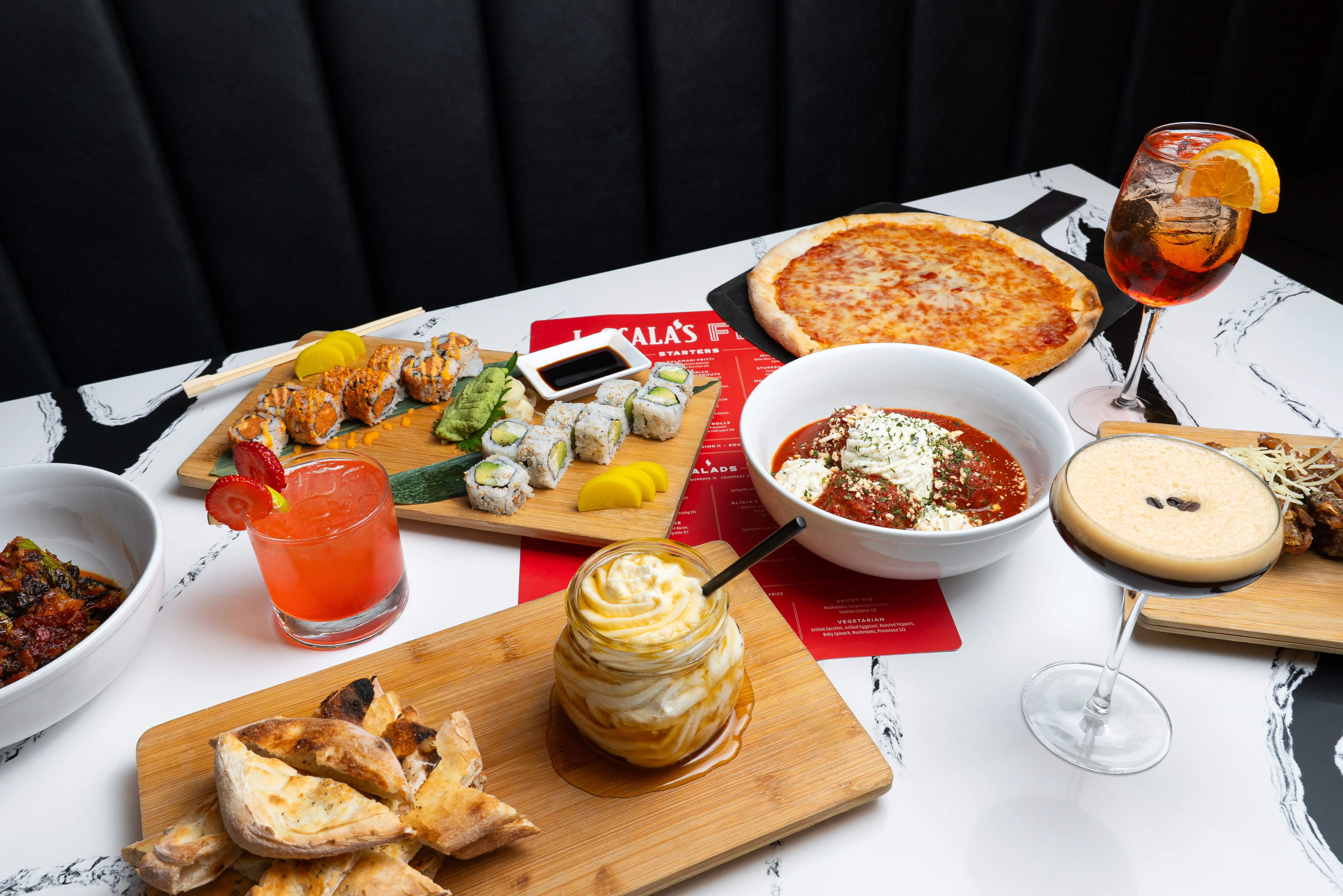 Assorted Italian dishes including pizza and pasta