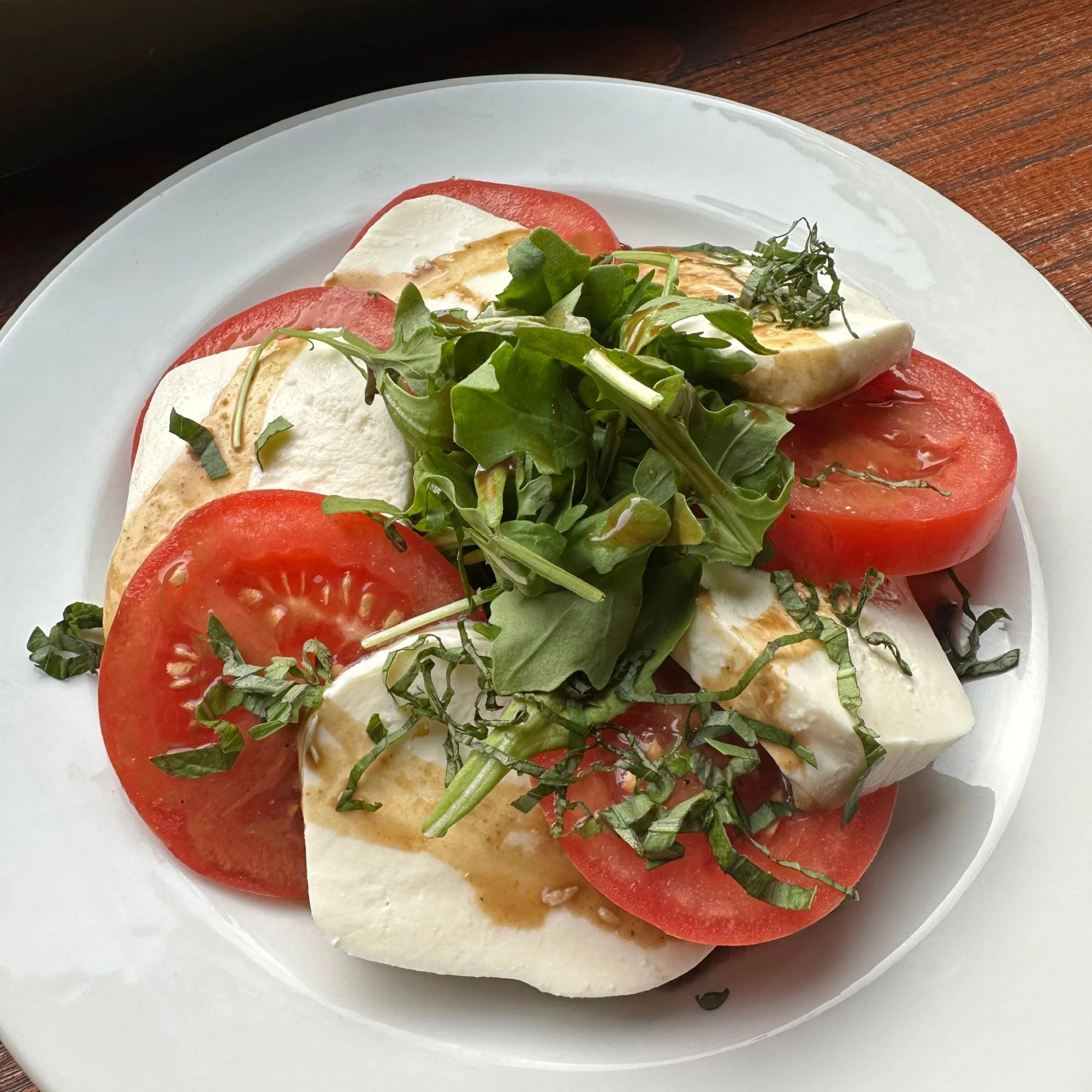 Caprese salad with fresh mozzarella and tomatoes