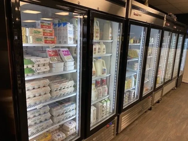 Refrigerated display of dairy products and eggs in a grocery store