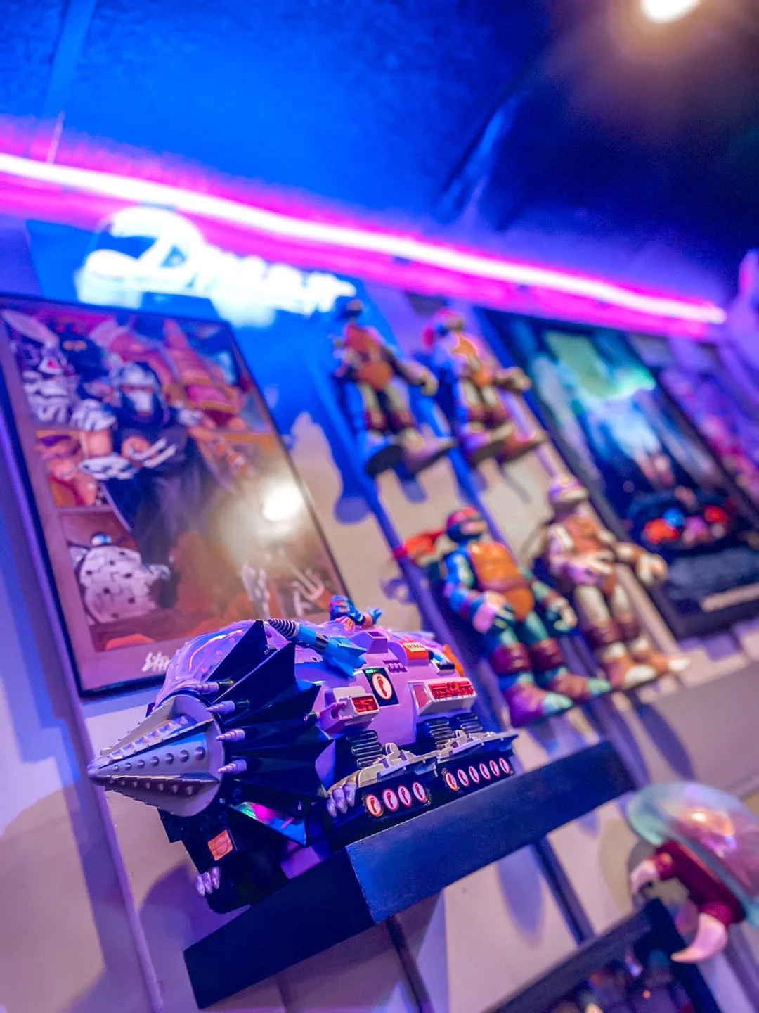 Colorful display of retro toys and posters in a vibrant restaurant setting