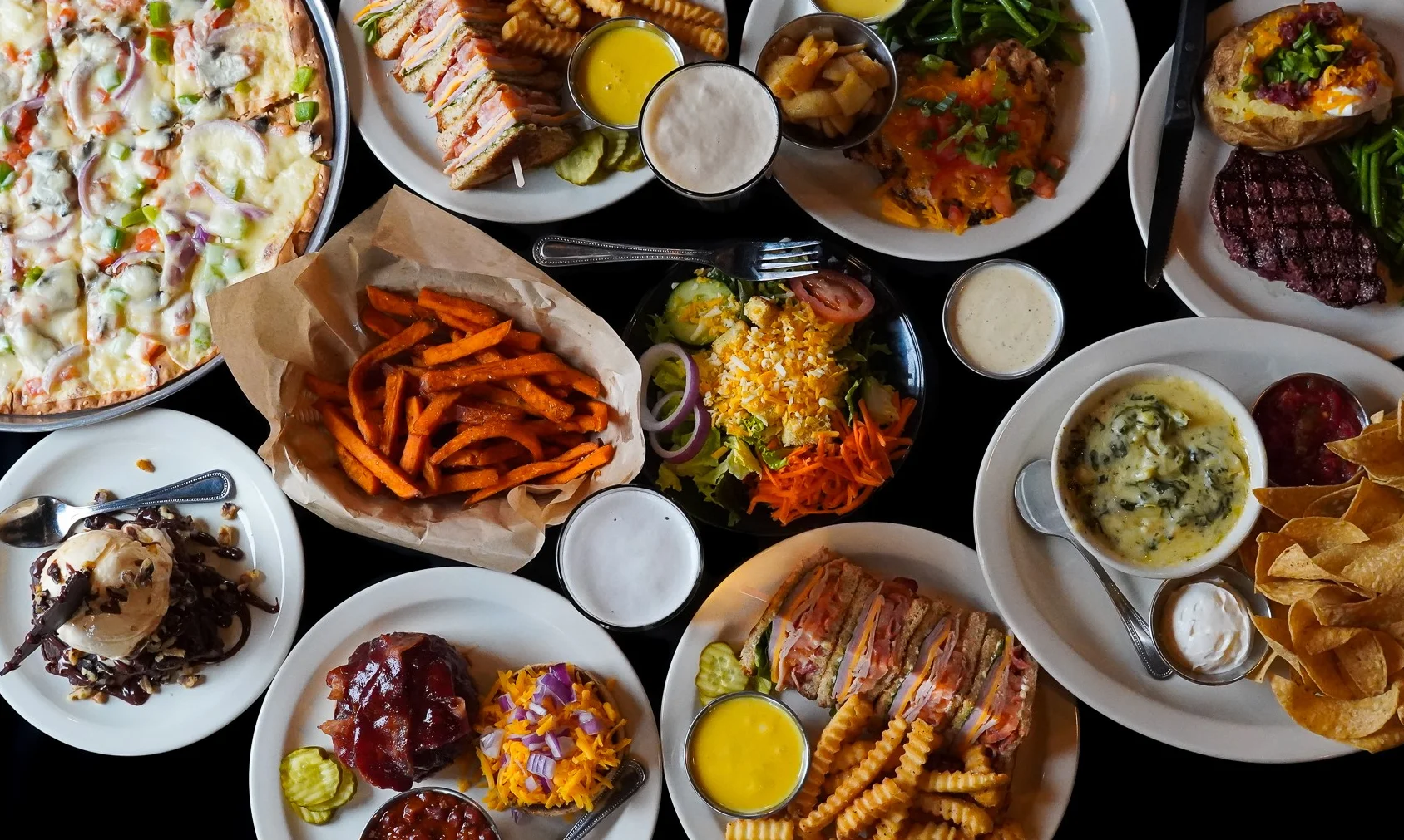 Variety of American comfort food dishes on a table