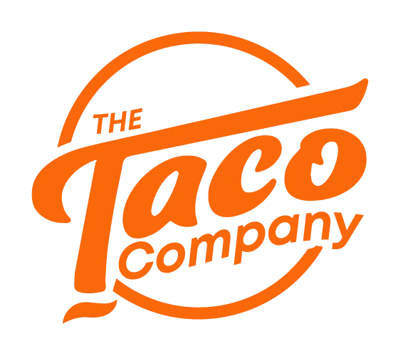 Logo of The Taco Company featuring bold orange lettering