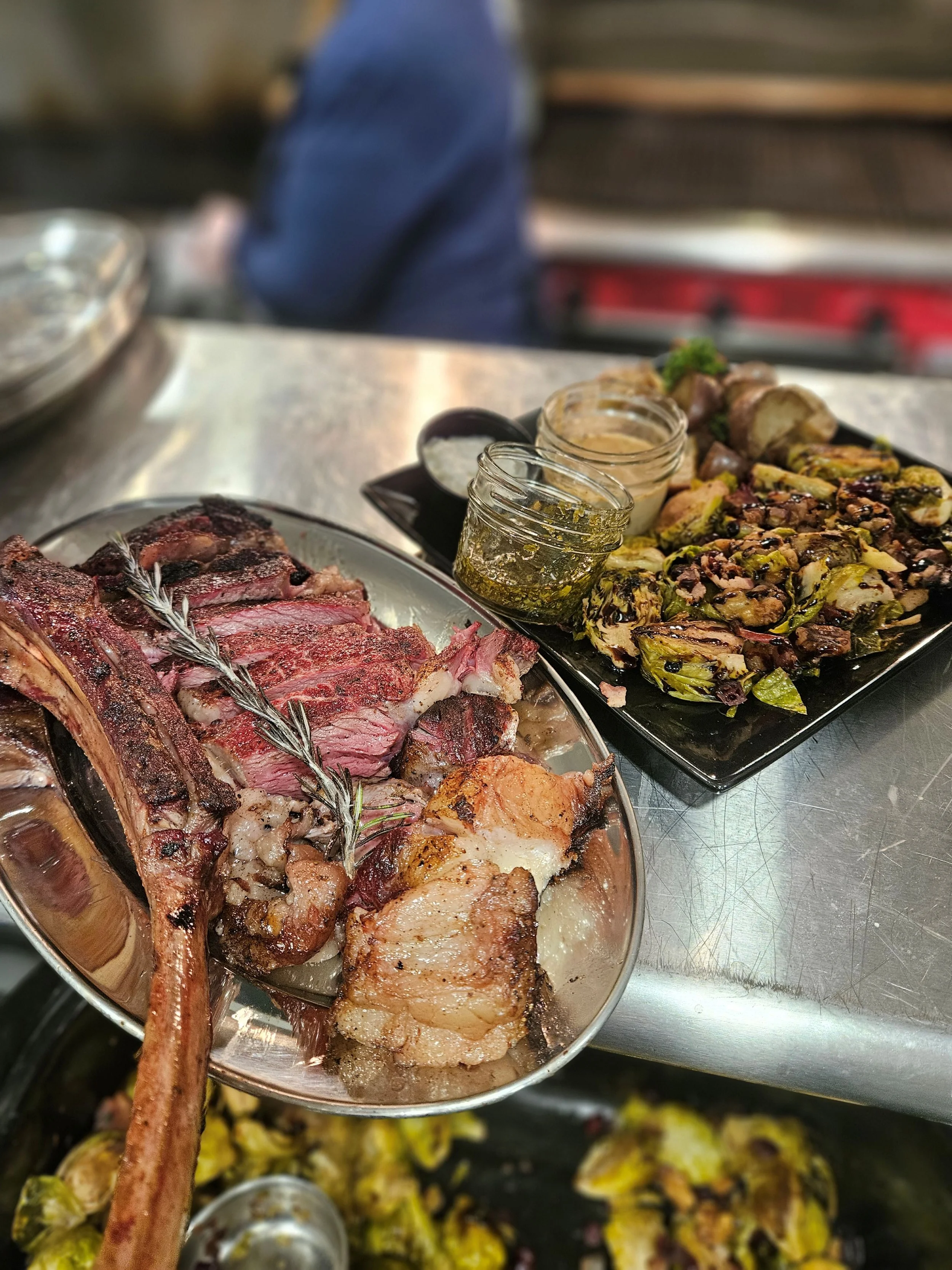 Grilled tomahawk steak with roasted Brussels sprouts