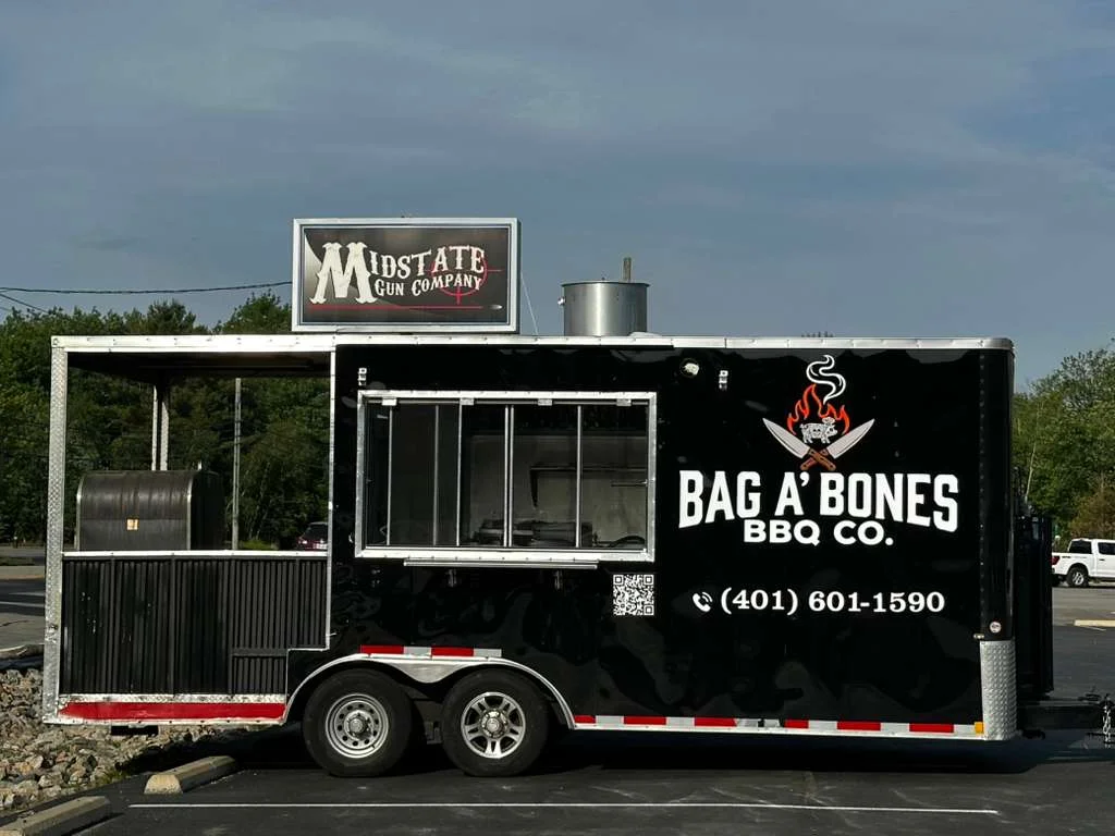 Mobile BBQ food truck serving delicious barbecue