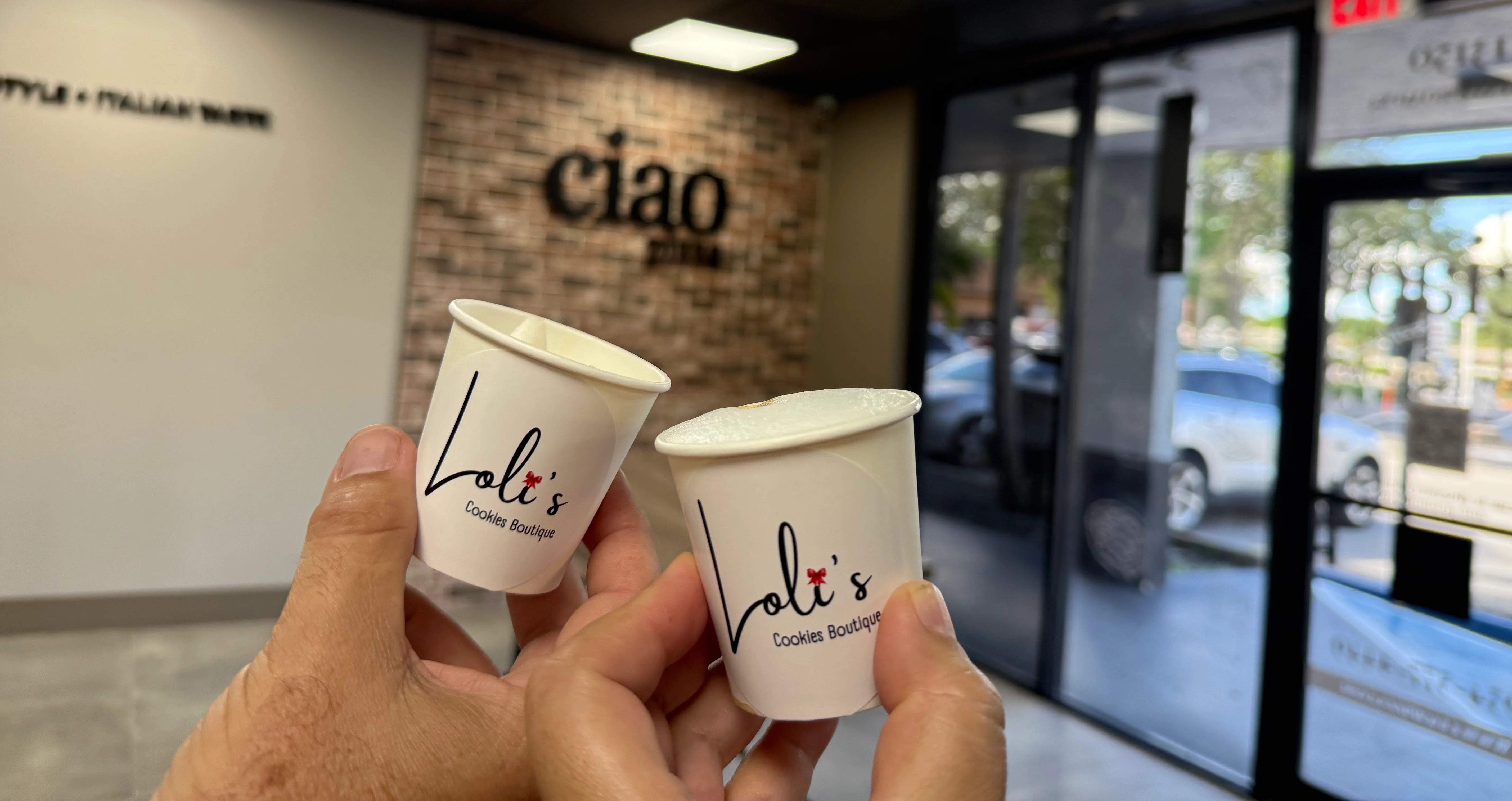 Cheers with Loli's cookie cups in a cozy boutique setting