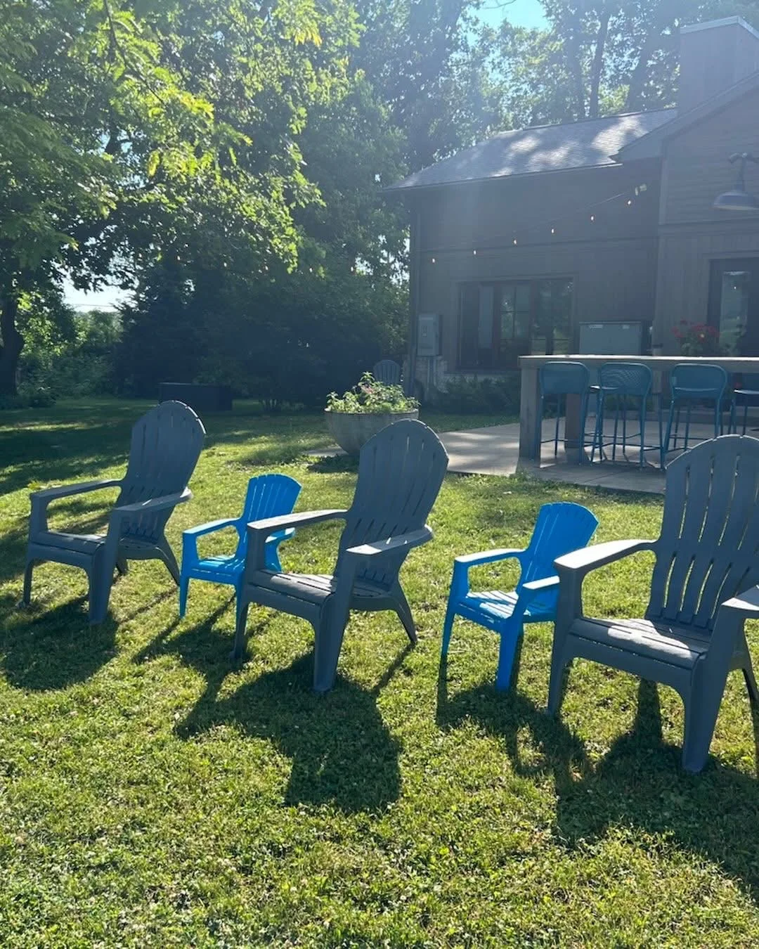 Colorful outdoor seating arrangement in a sunny garden