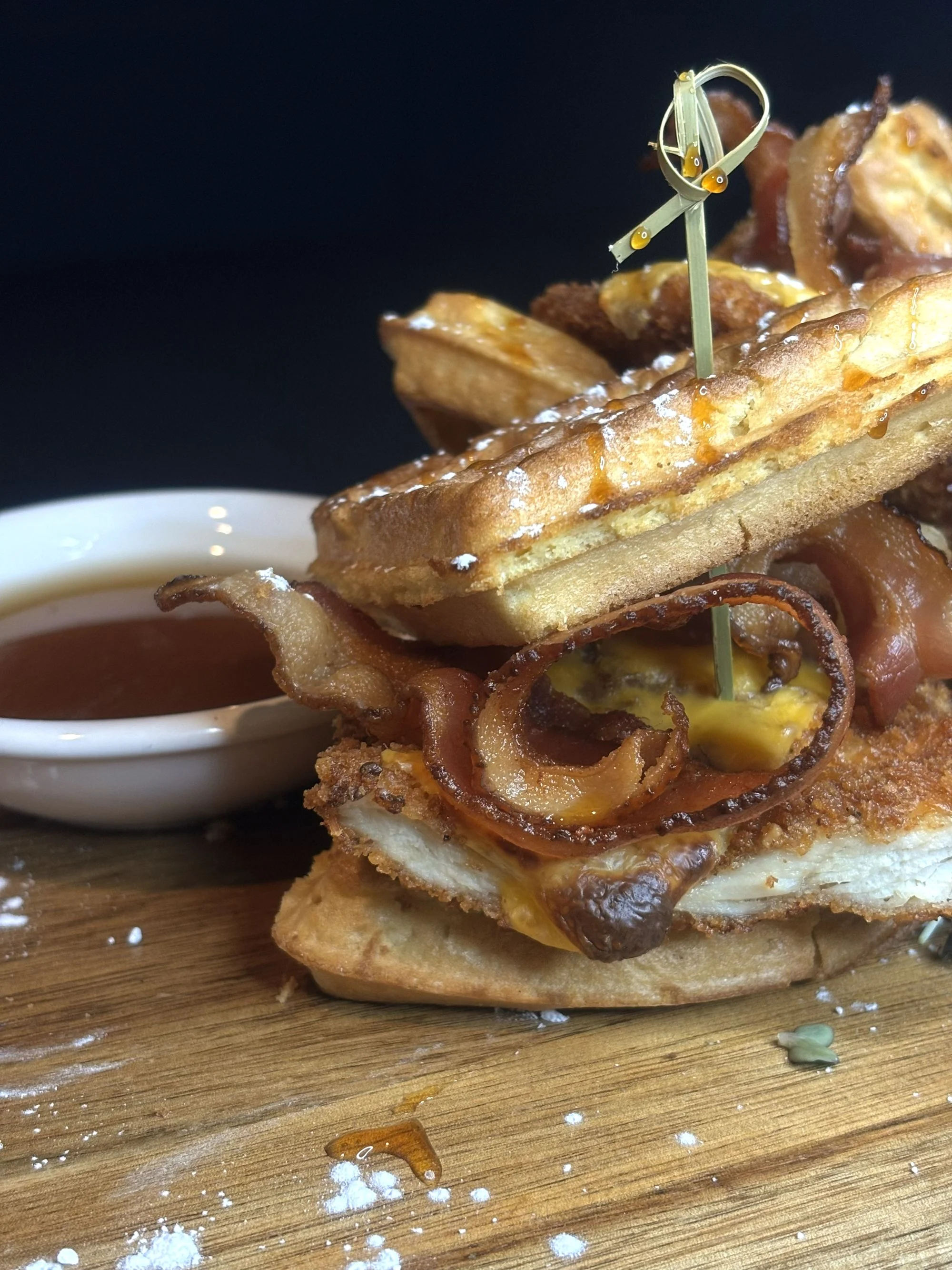 Southern chicken and waffles with syrup and bacon