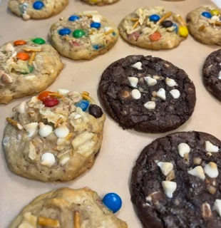 Assorted cookies including chocolate chip and oatmeal varieties