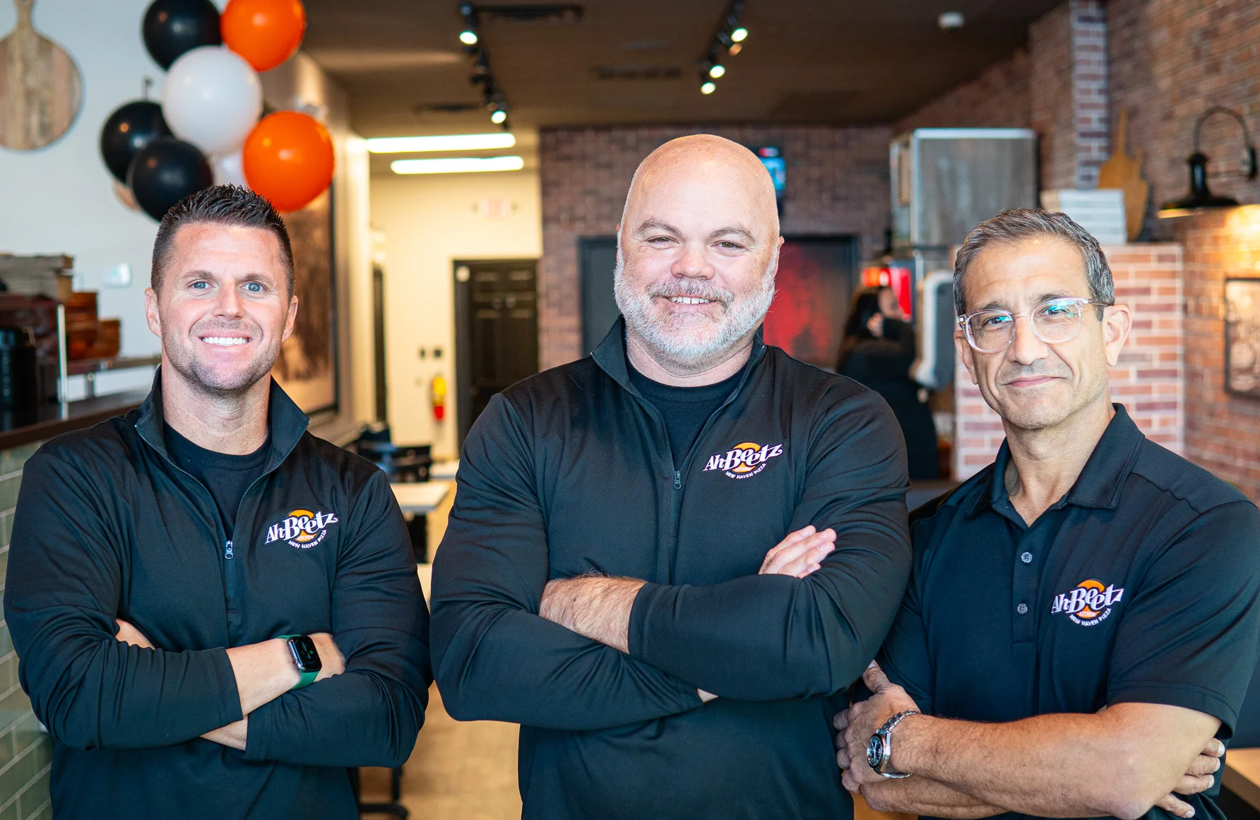 A team at Ah Beetz Pizza