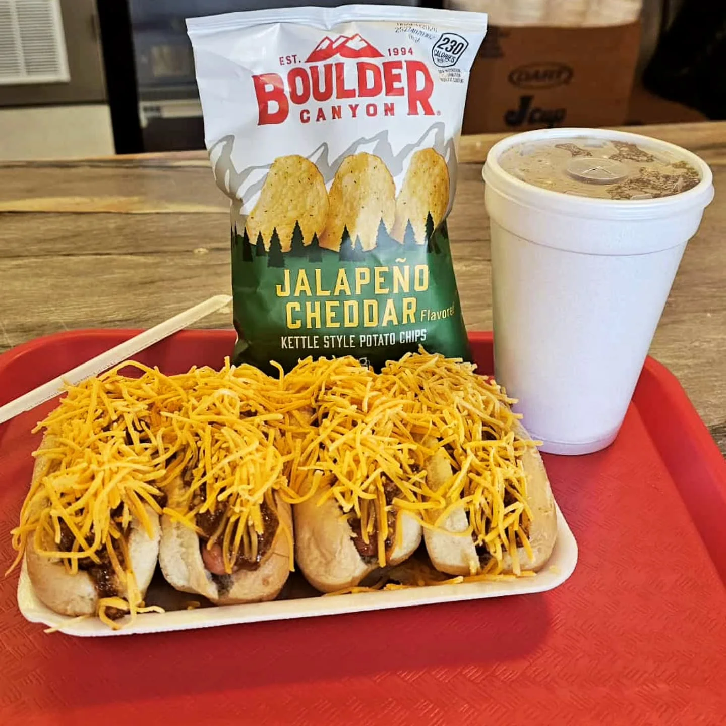 Loaded chili cheese dogs with jalapeño cheddar chips