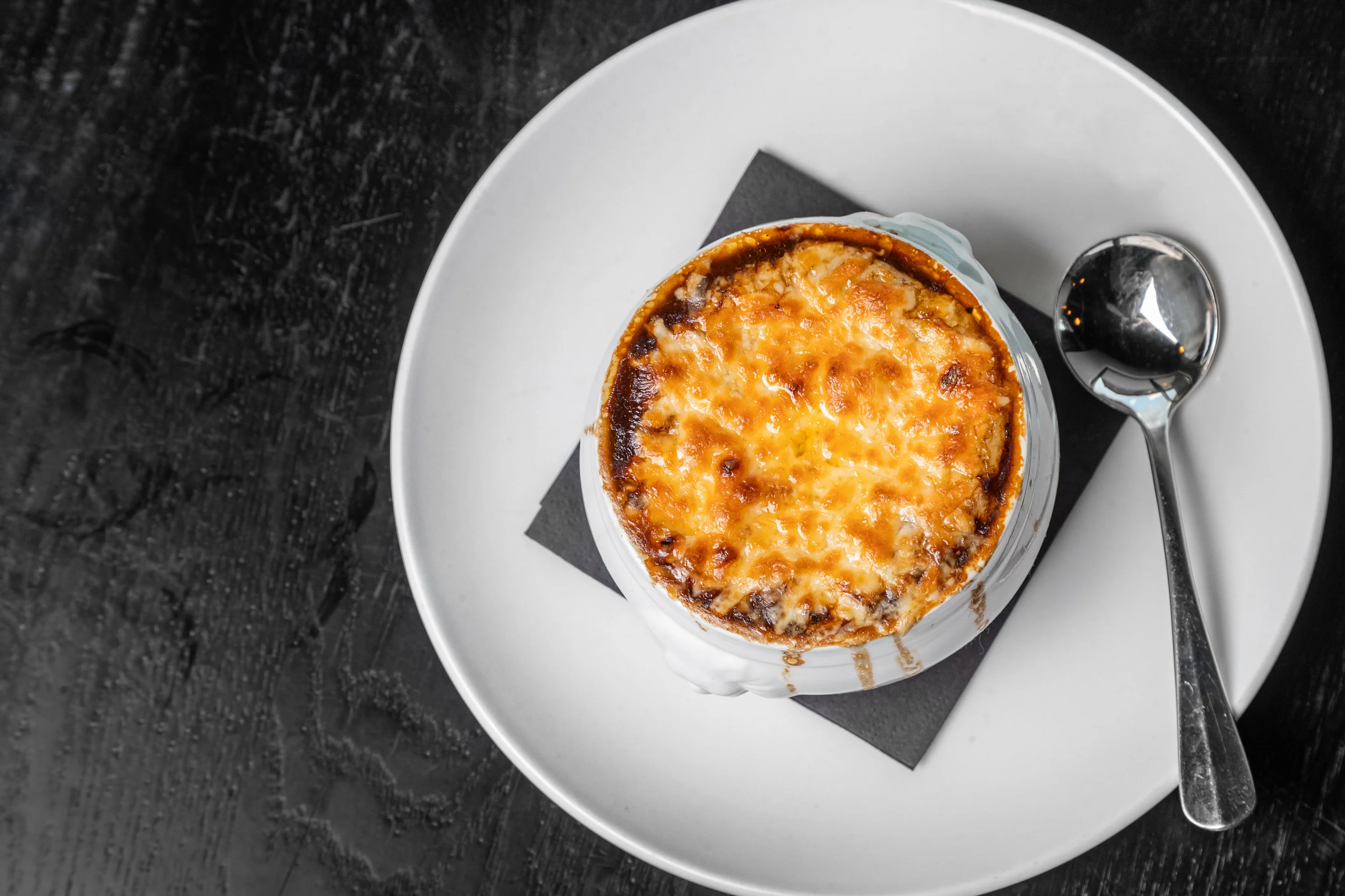 French onion soup topped with melted cheese