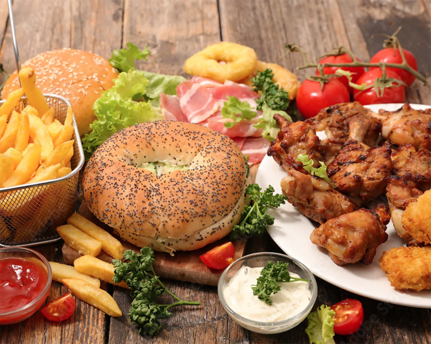 Delicious gourmet burger with fresh toppings on a wooden table