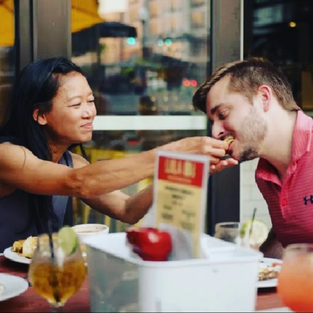 Couple sharing a meal at a cozy restaurant