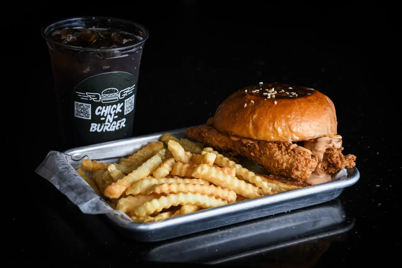 Crispy fried chicken sandwich with crinkle-cut fries