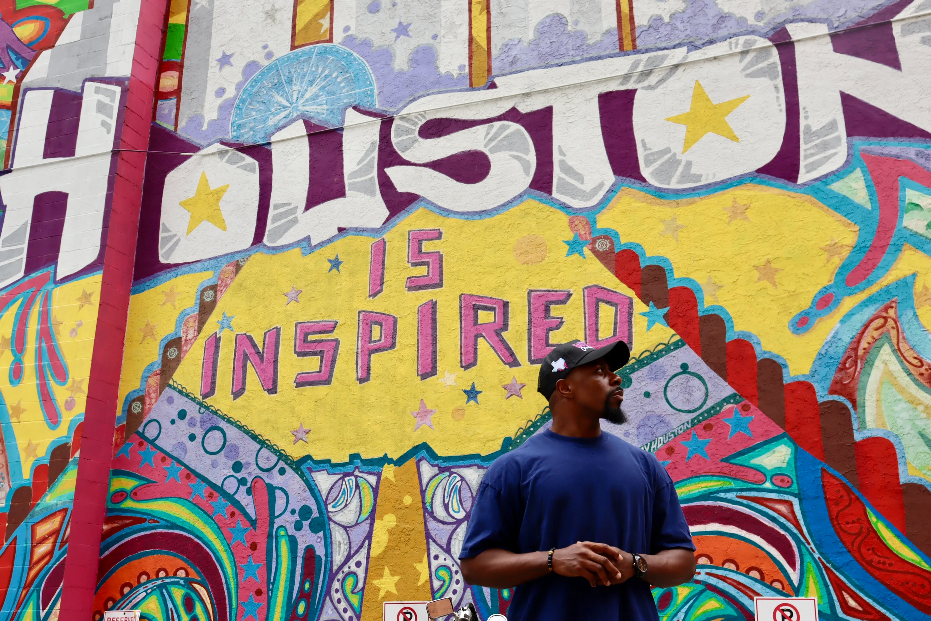 Colorful mural in Houston with the text 'Houston is Inspired'