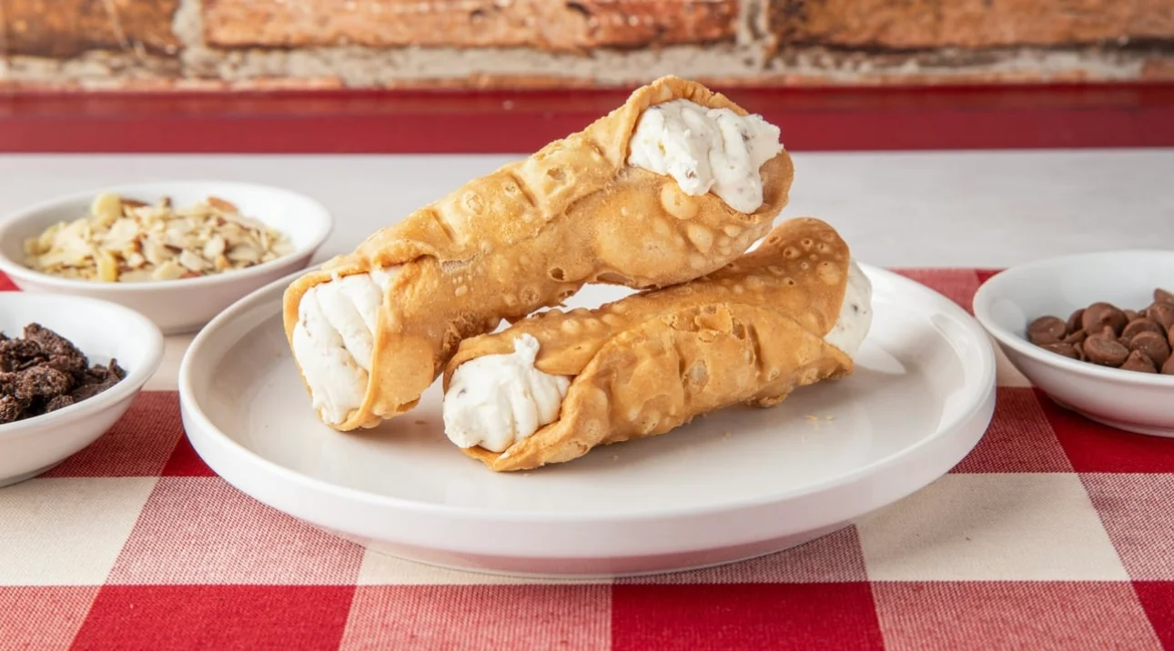Classic Italian cannoli filled with sweet ricotta cream