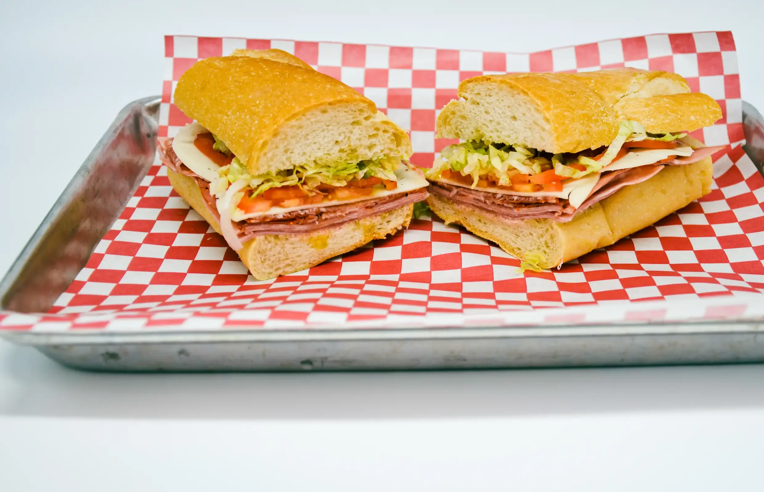 Italian sub sandwich with meats and fresh vegetables