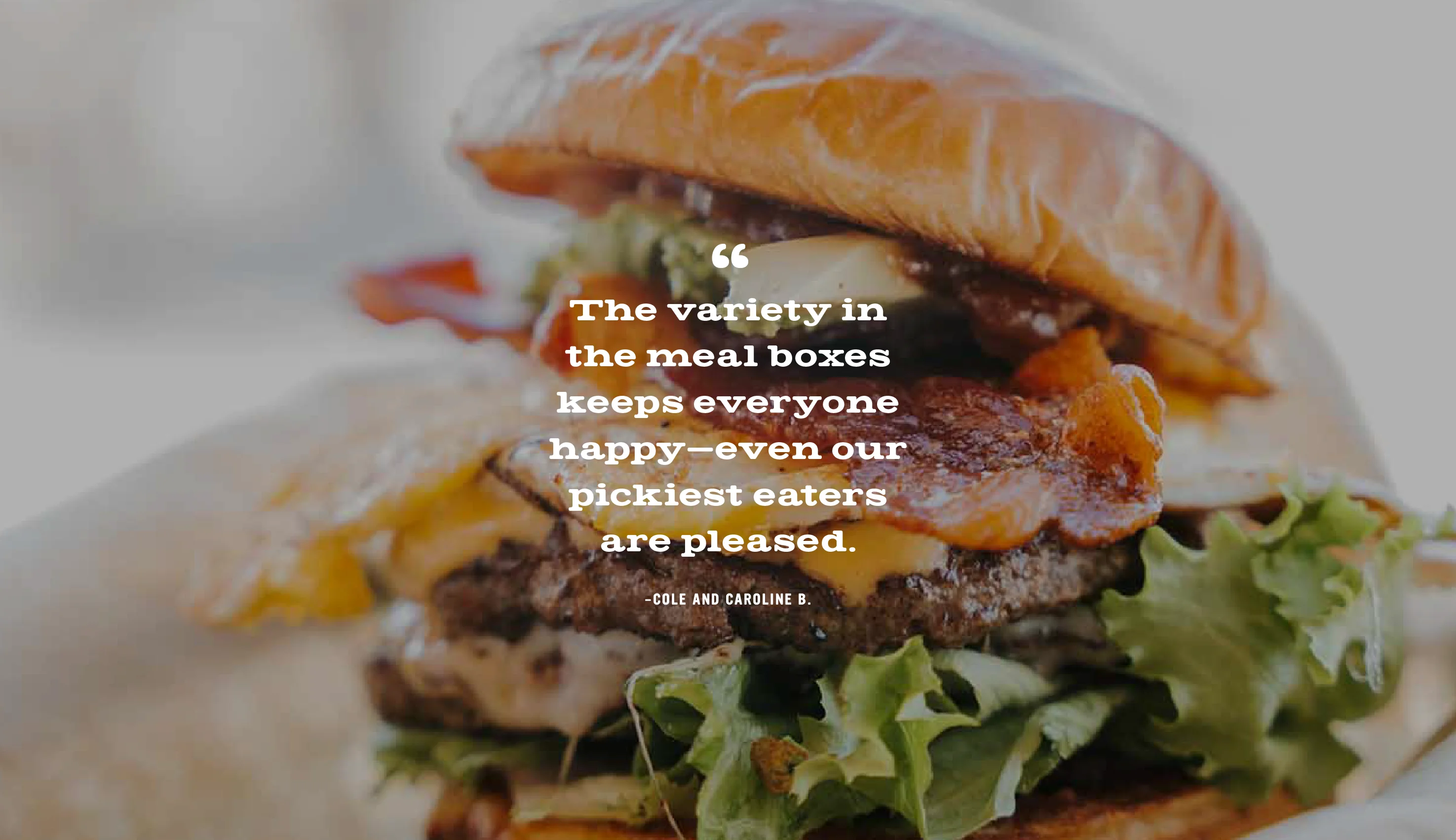 A photo of a juicy bacon cheeseburger. Our office parties have never been better! The variety in the meal boxes keeps everyone happy—even our pickiest eaters  are pleased.