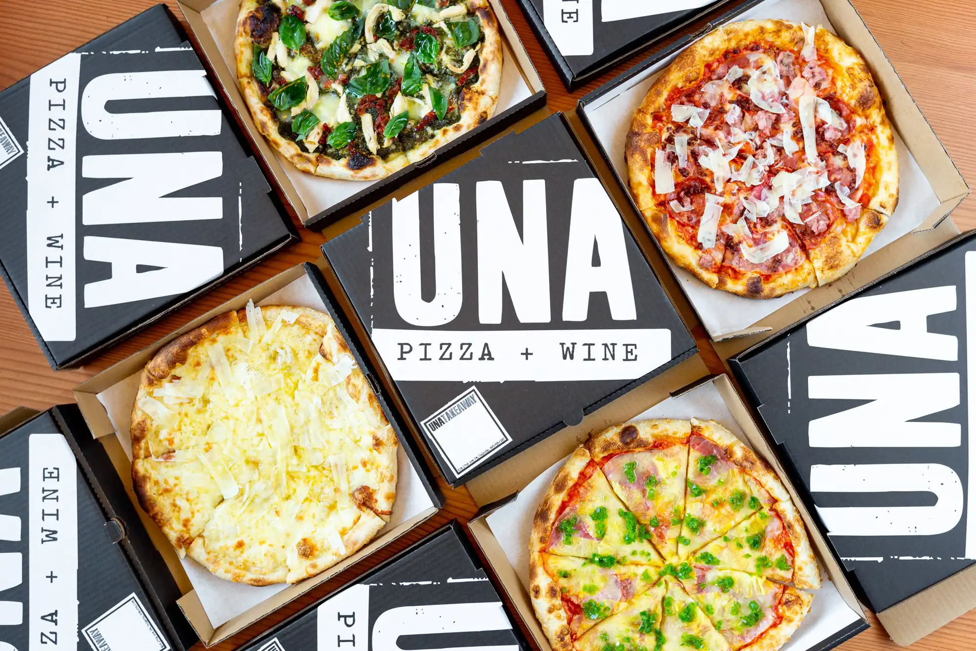 UNA pizza + wine Calgary 17th Ave take out bottle UNA house red