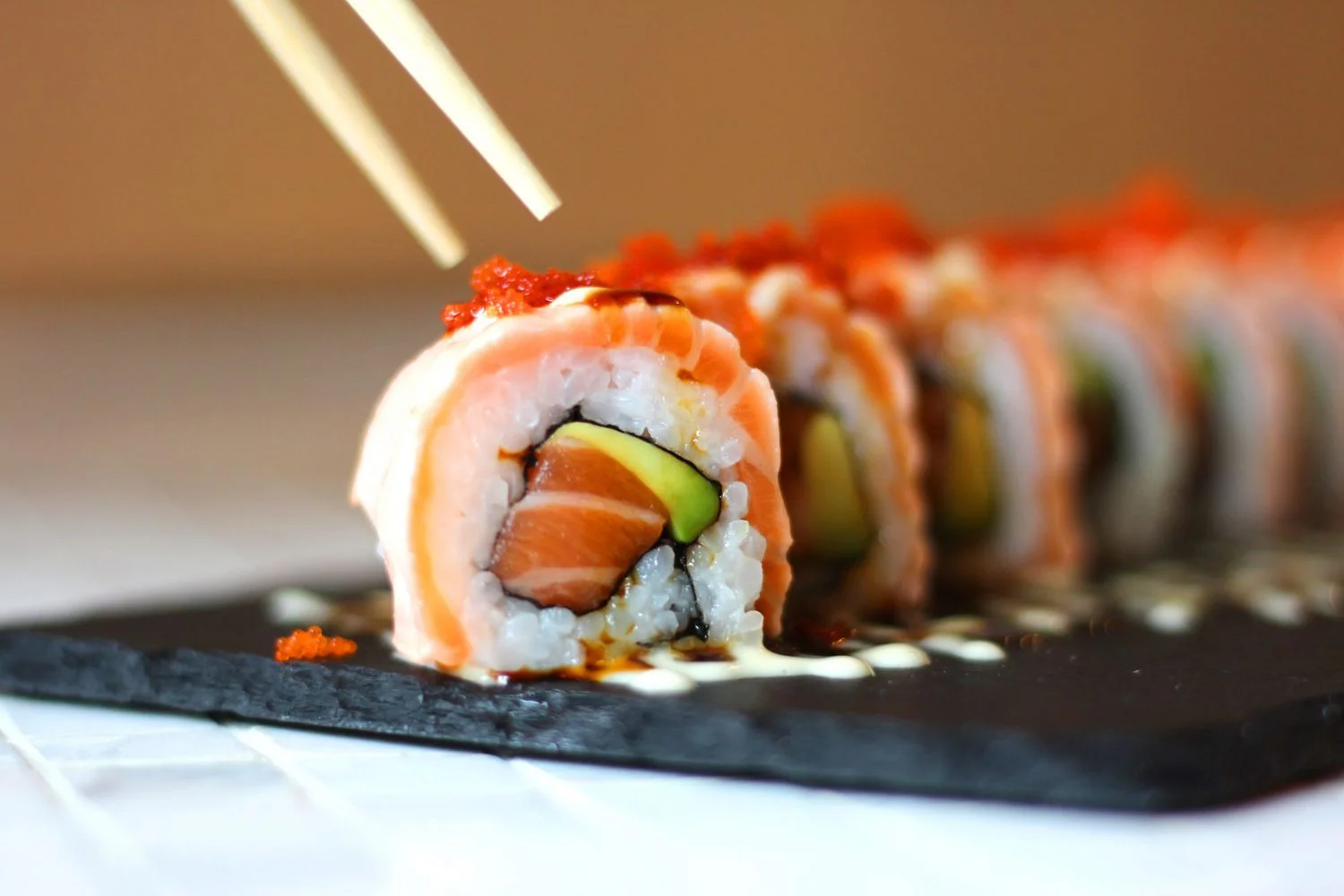 Japanese sushi roll with salmon and avocado