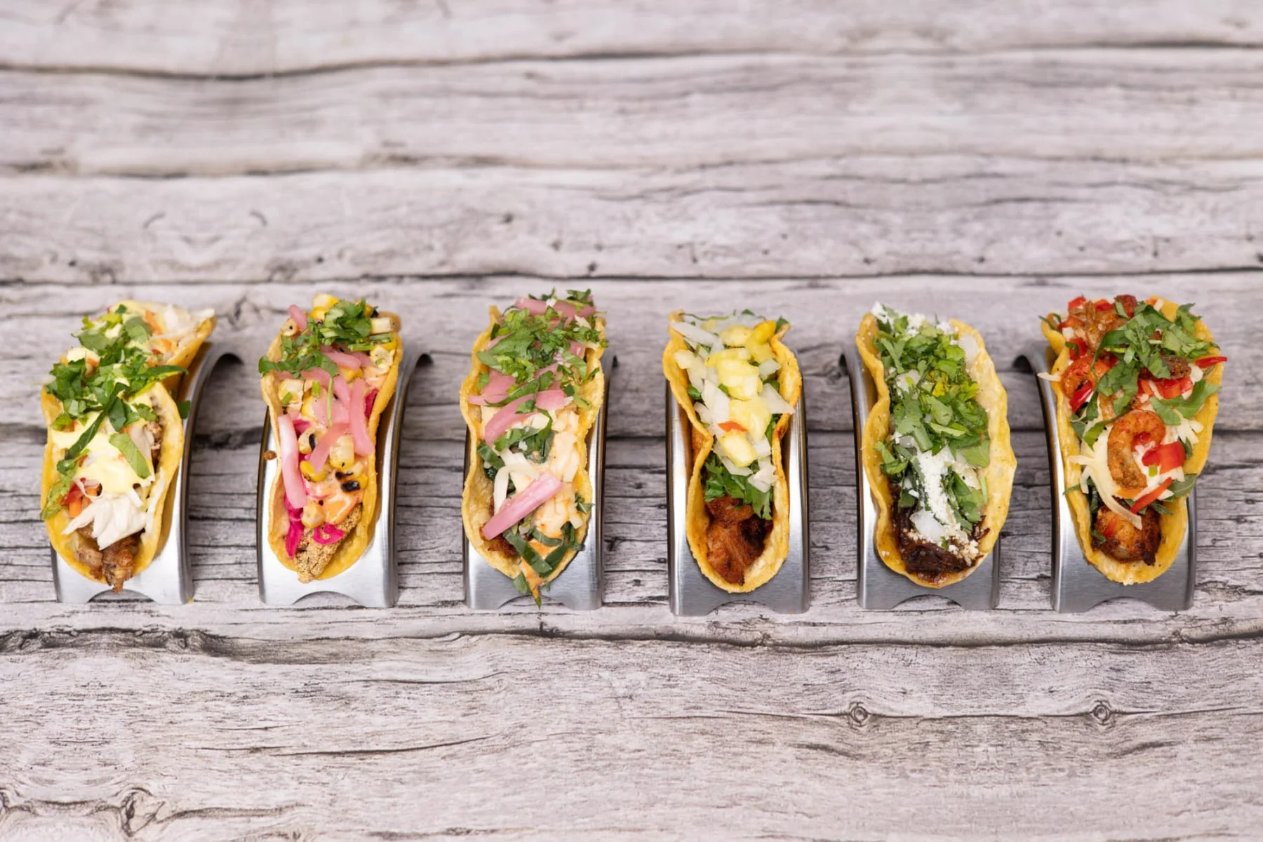 Assorted Mexican street tacos with fresh toppings