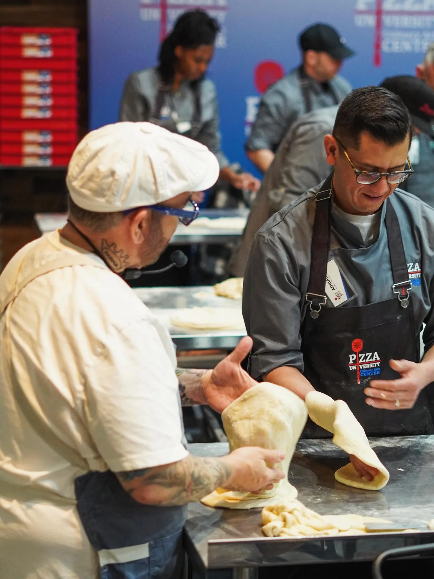 Pizza dough preparation at a culinary workshop