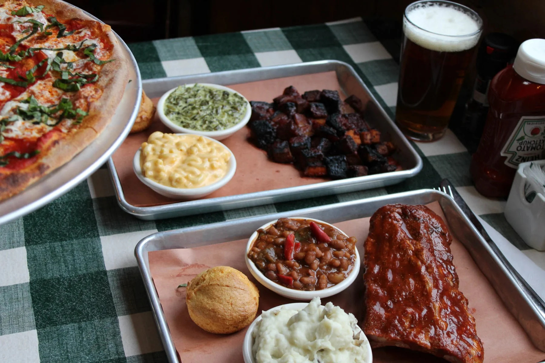 Barbecue platter with ribs, mac and cheese, and cornbread