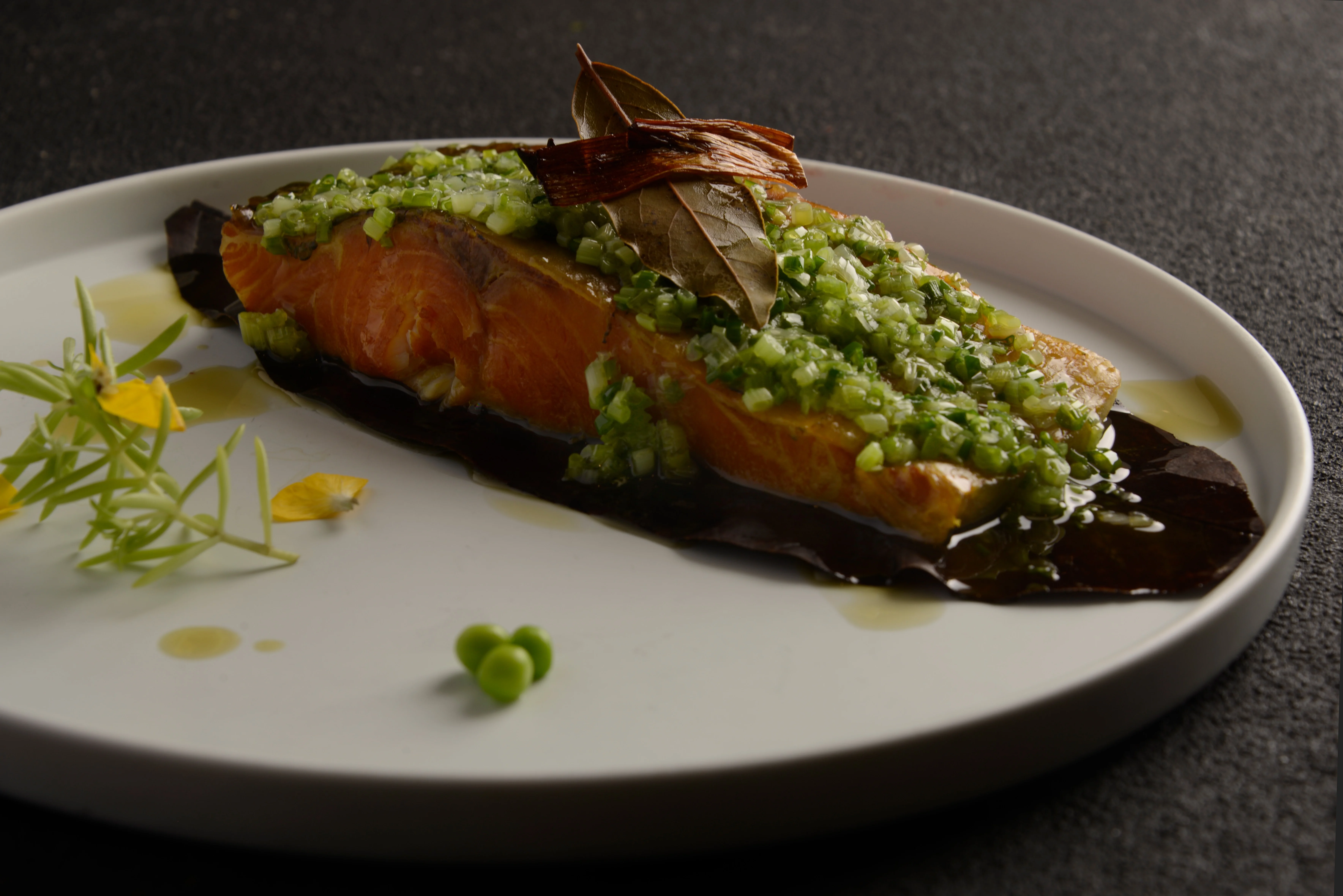 Grilled salmon with green sauce, a classic dish from Asian cuisine