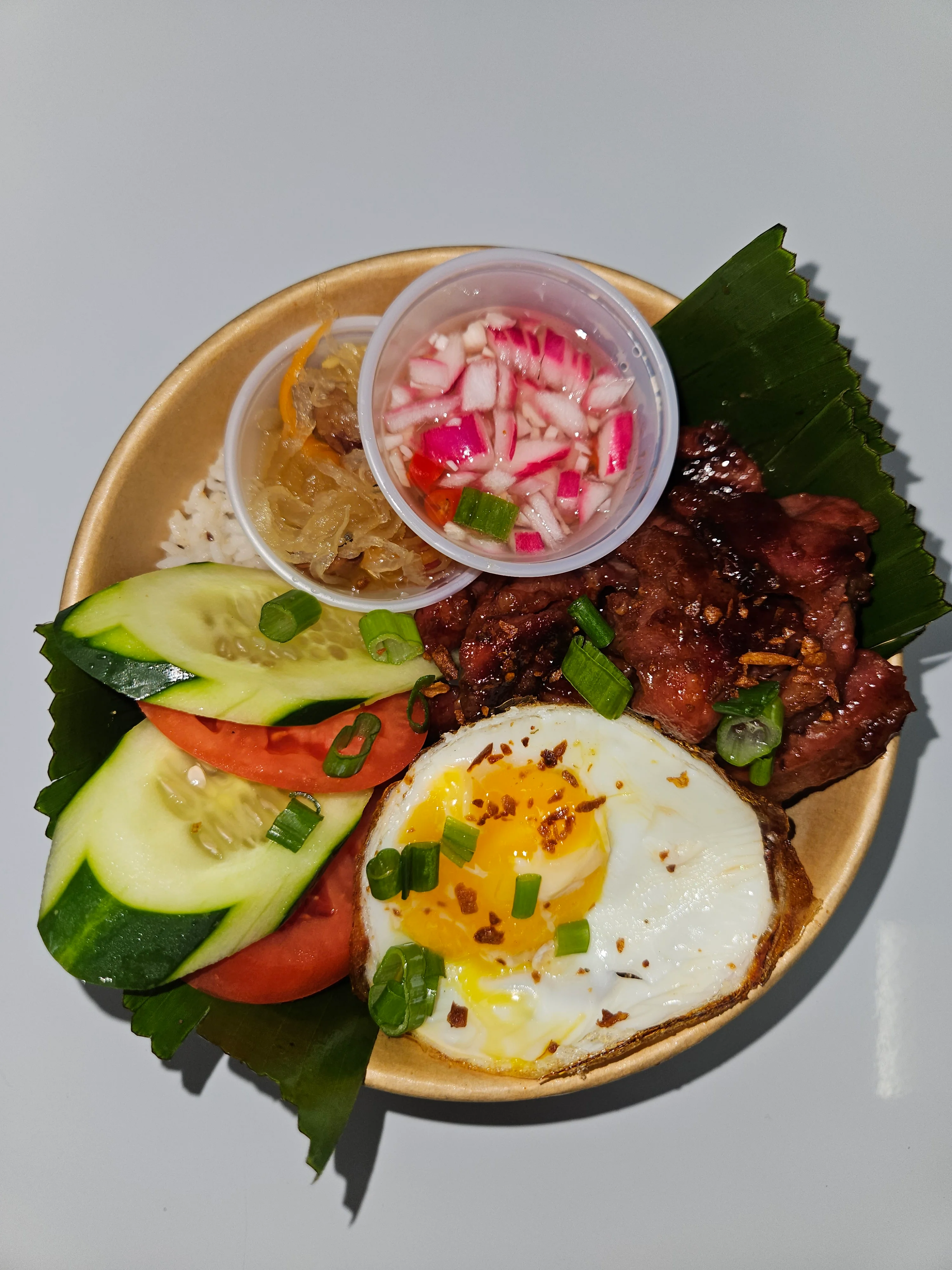Vietnamese com tam with grilled pork and fried egg