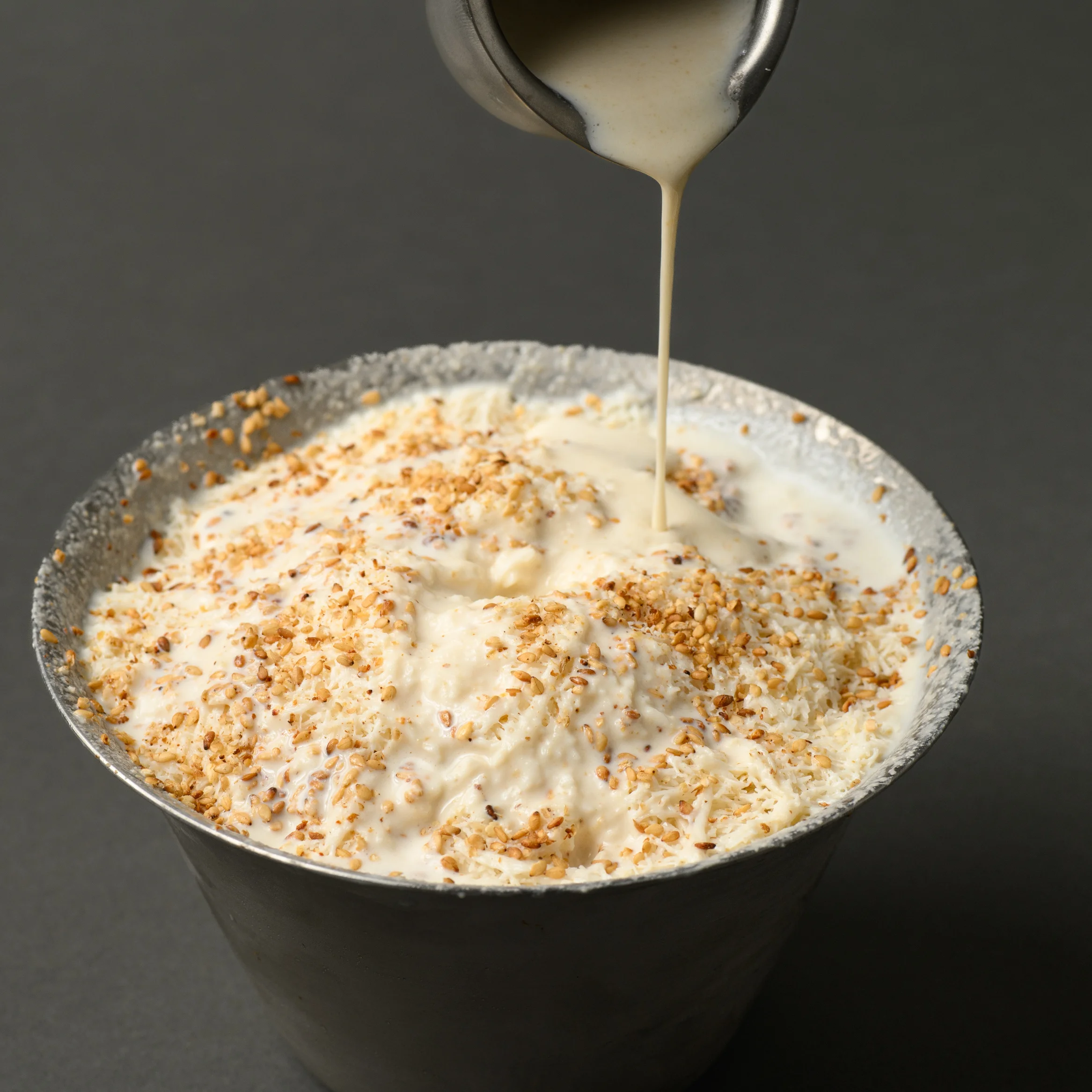 Creamy Indian kulfi topped with toasted nuts