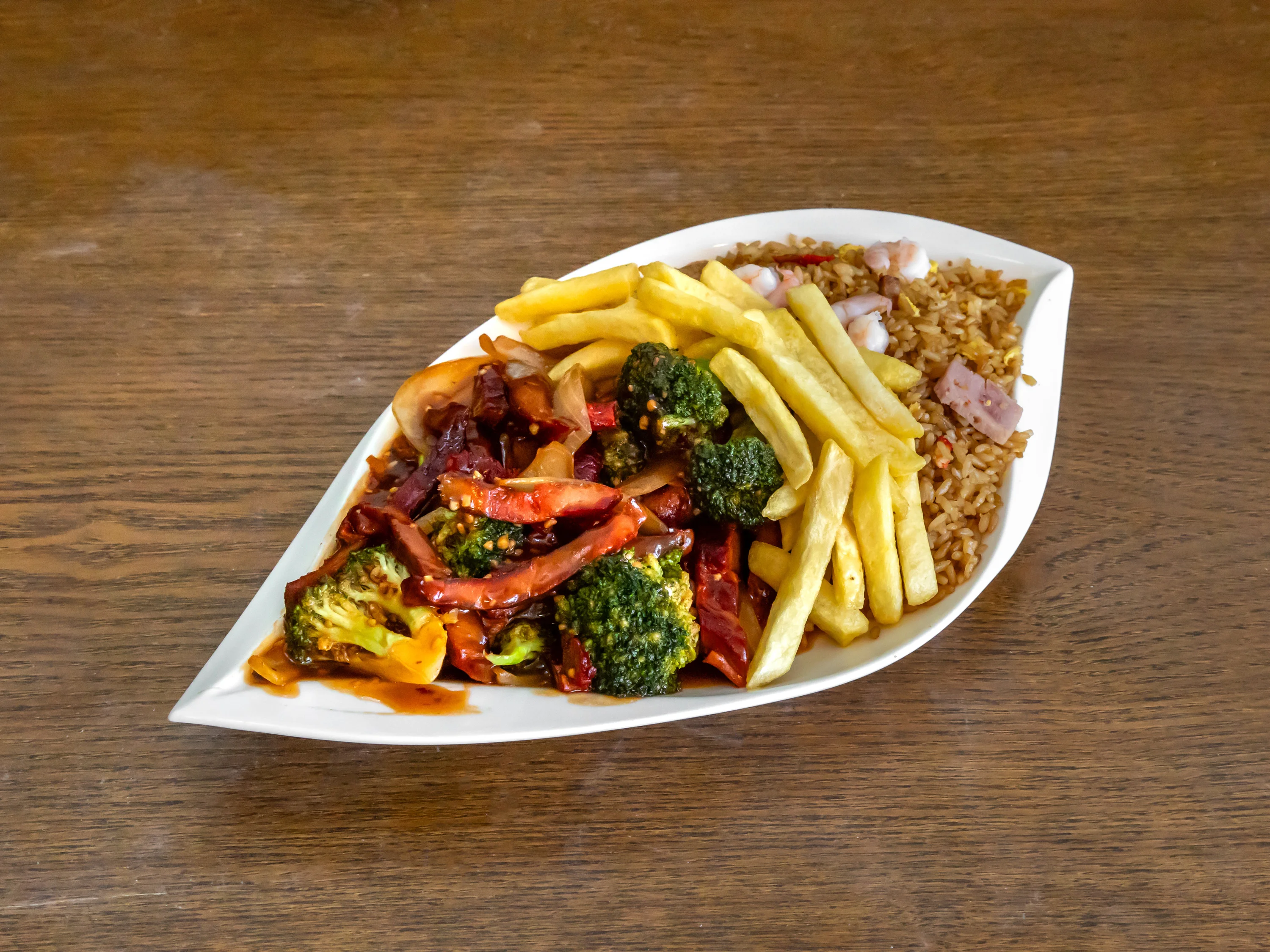 Chinese stir-fried vegetables with rice and fries