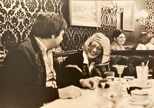 Cozy restaurant scene with friends enjoying conversation