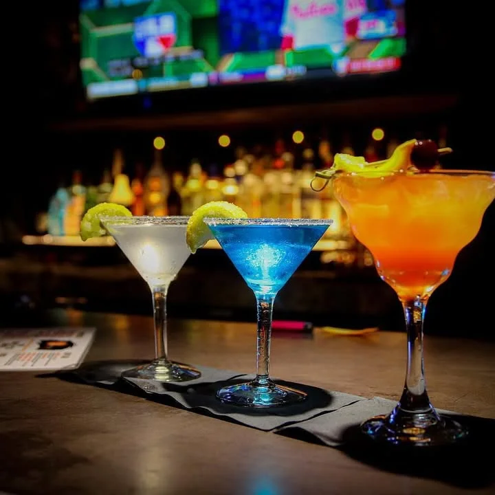 Colorful cocktails at a modern bar counter