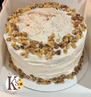 Classic walnut layer cake with cream frosting