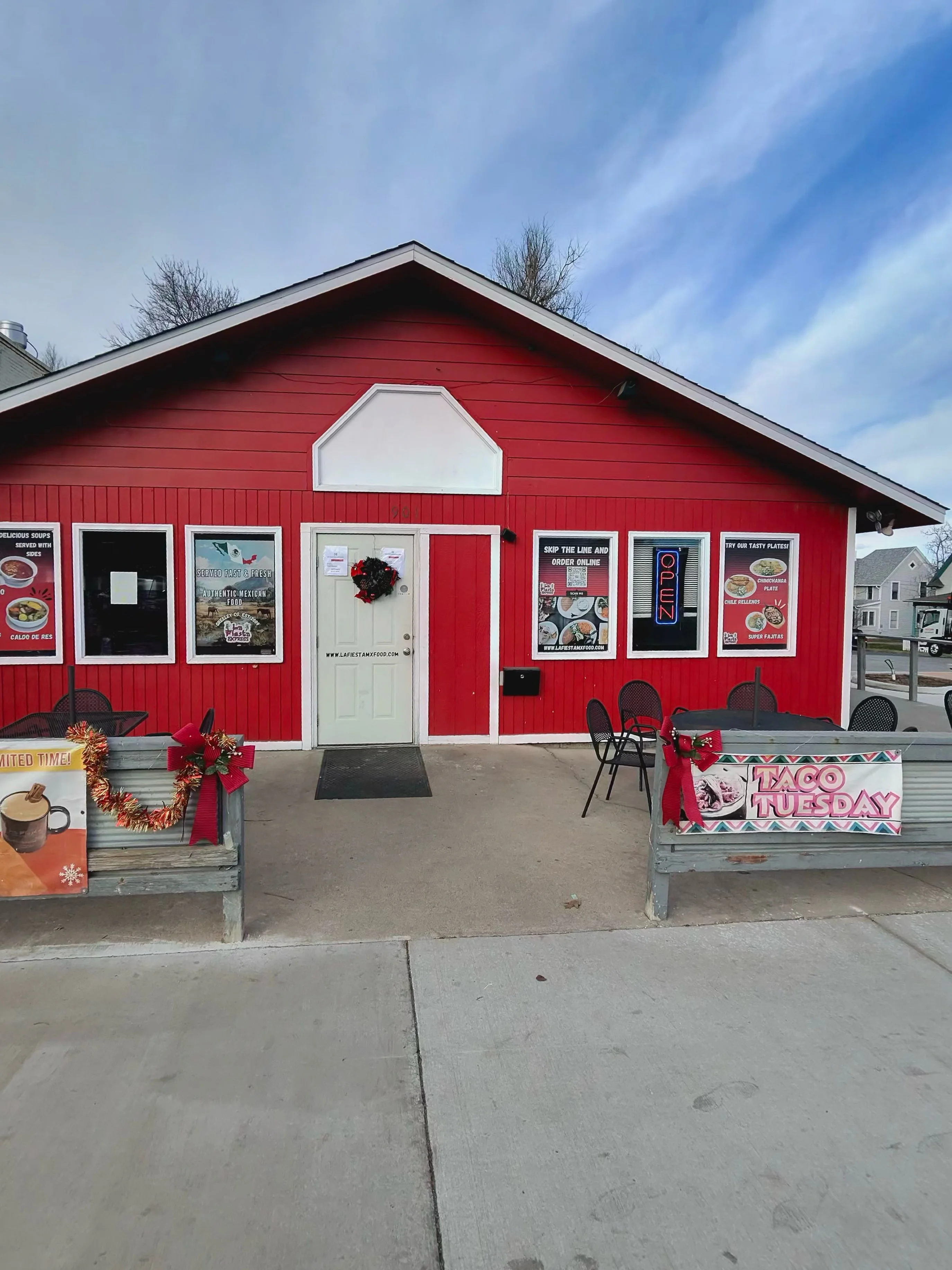 Charming red restaurant exterior with festive decor