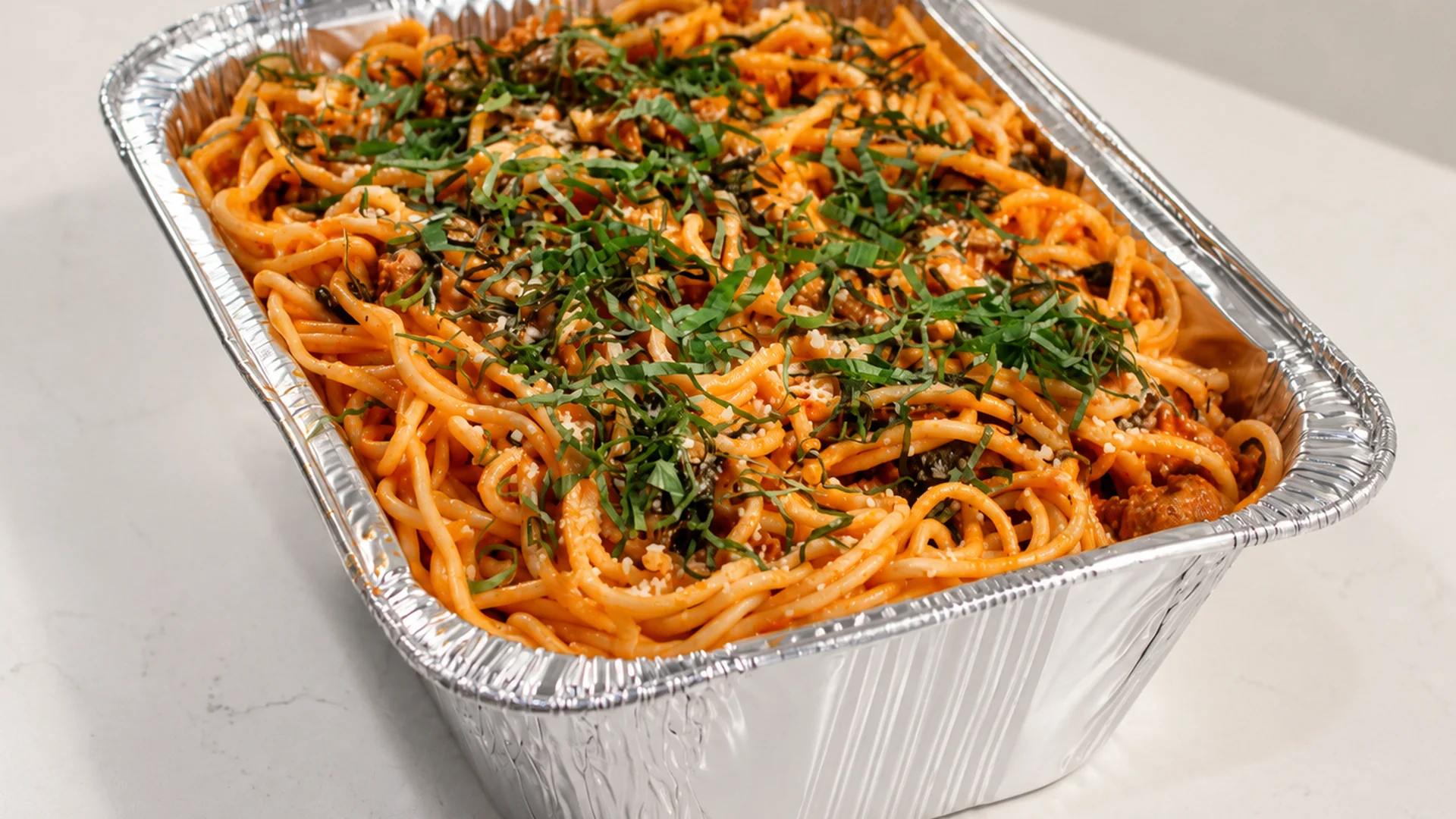 Vodka sausage bucatini catering tray from Maddalena's Italian Cafe