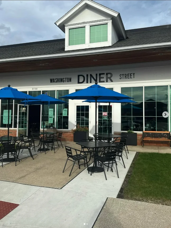 A vibrant restaurant interior with colorful decor and inviting seating.
