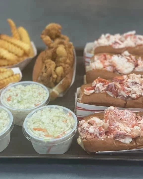 New England lobster rolls with coleslaw and fried shrimp