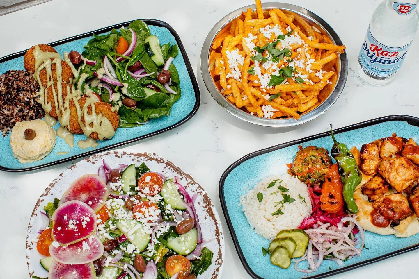 Mediterranean platter with falafel, salad, and rice