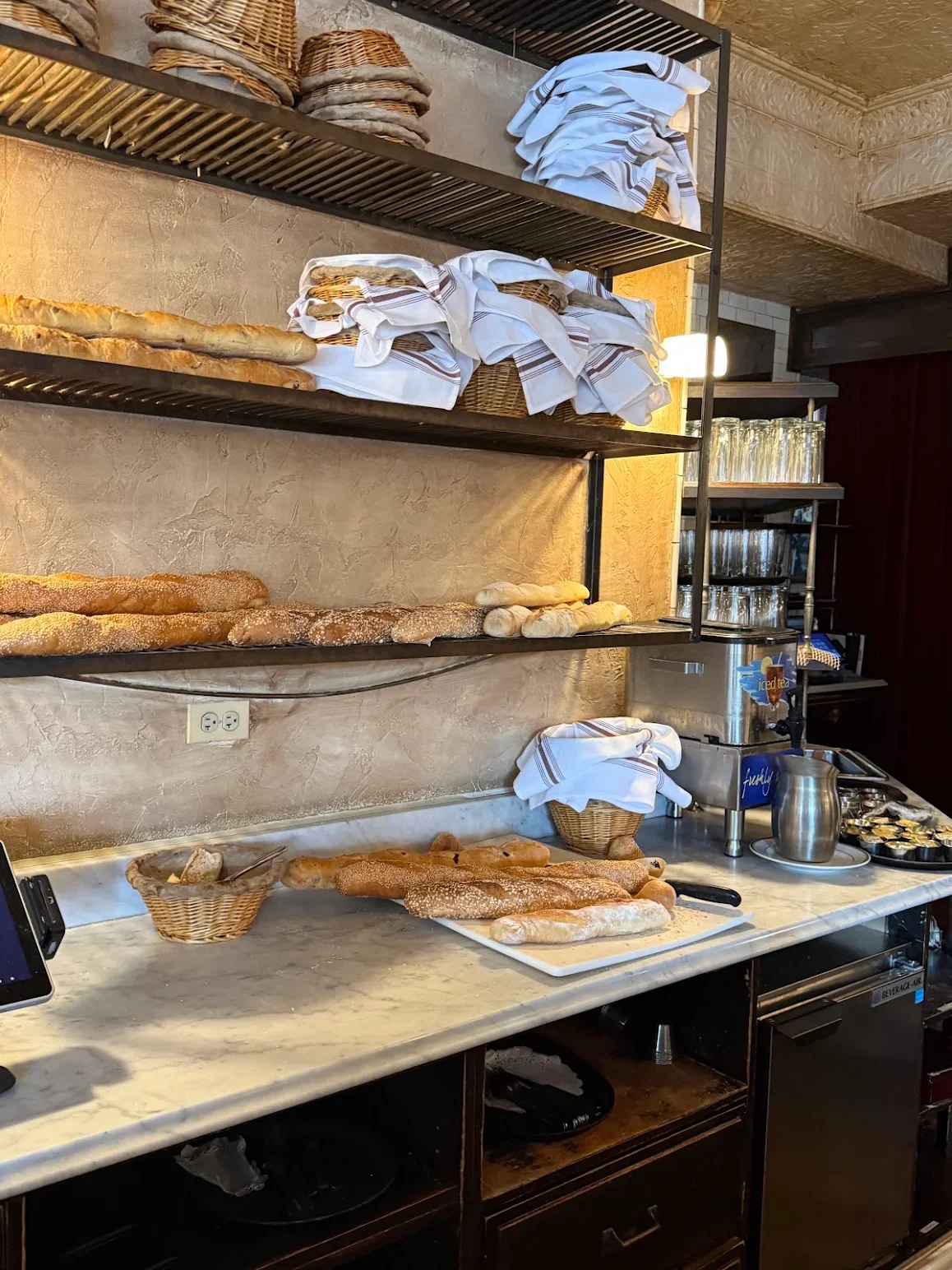 Artisan bread display in a rustic restaurant setting