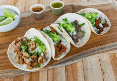 Assorted Mexican street tacos with fresh toppings