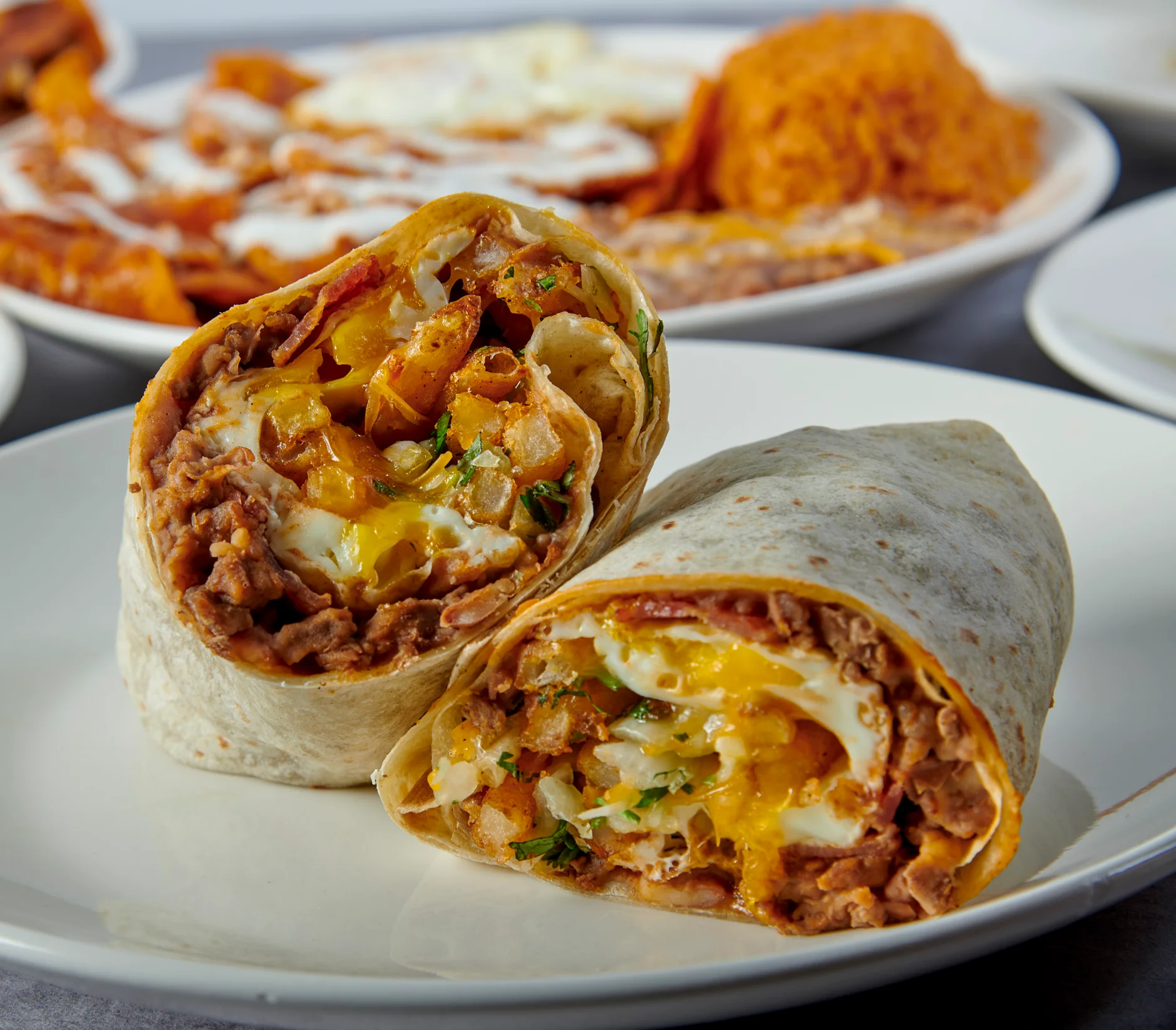 Delicious breakfast burrito with eggs and beans