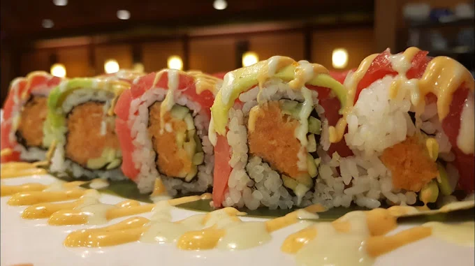 Colorful sushi rolls with spicy tuna and avocado