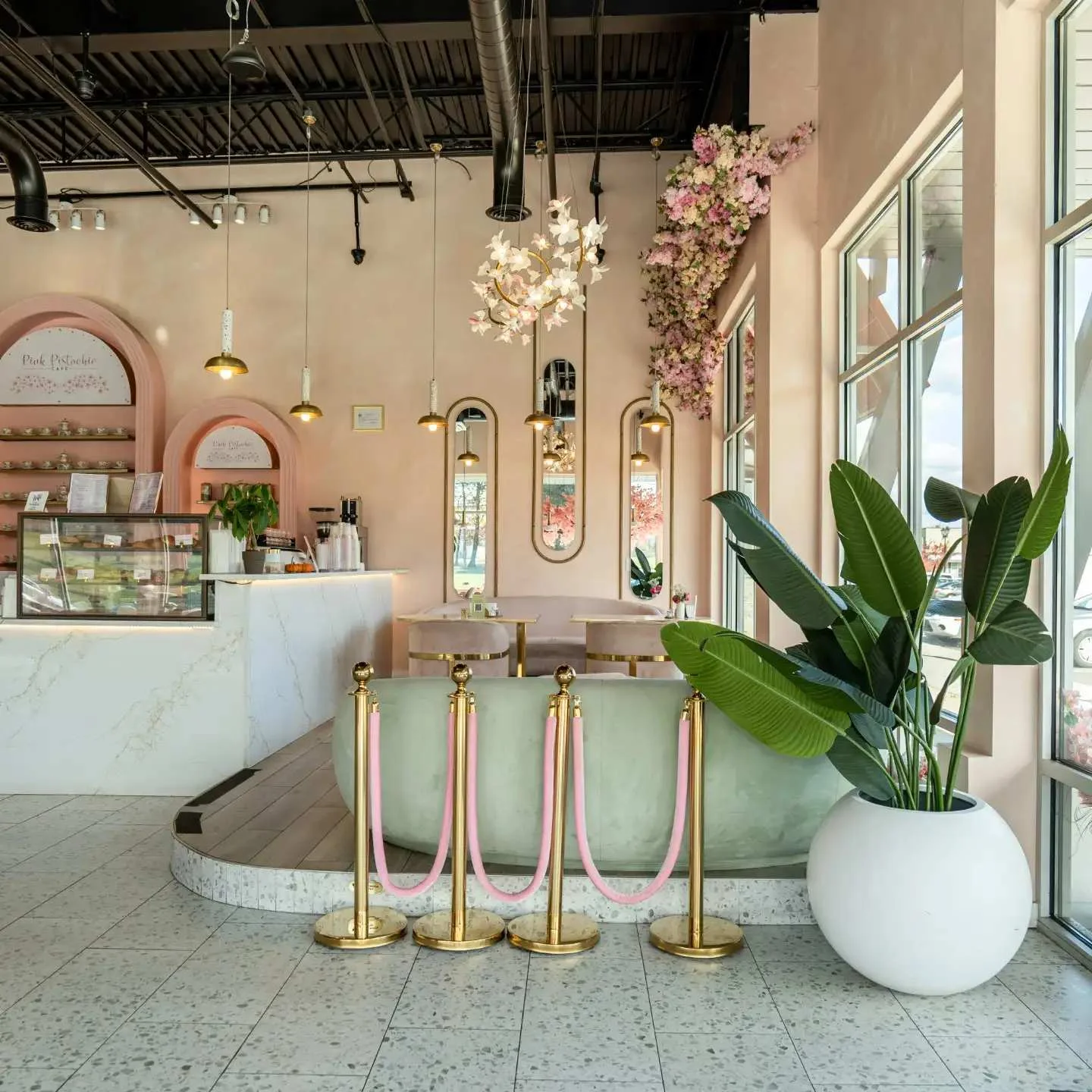 Charming café interior with pastel decor and elegant lighting